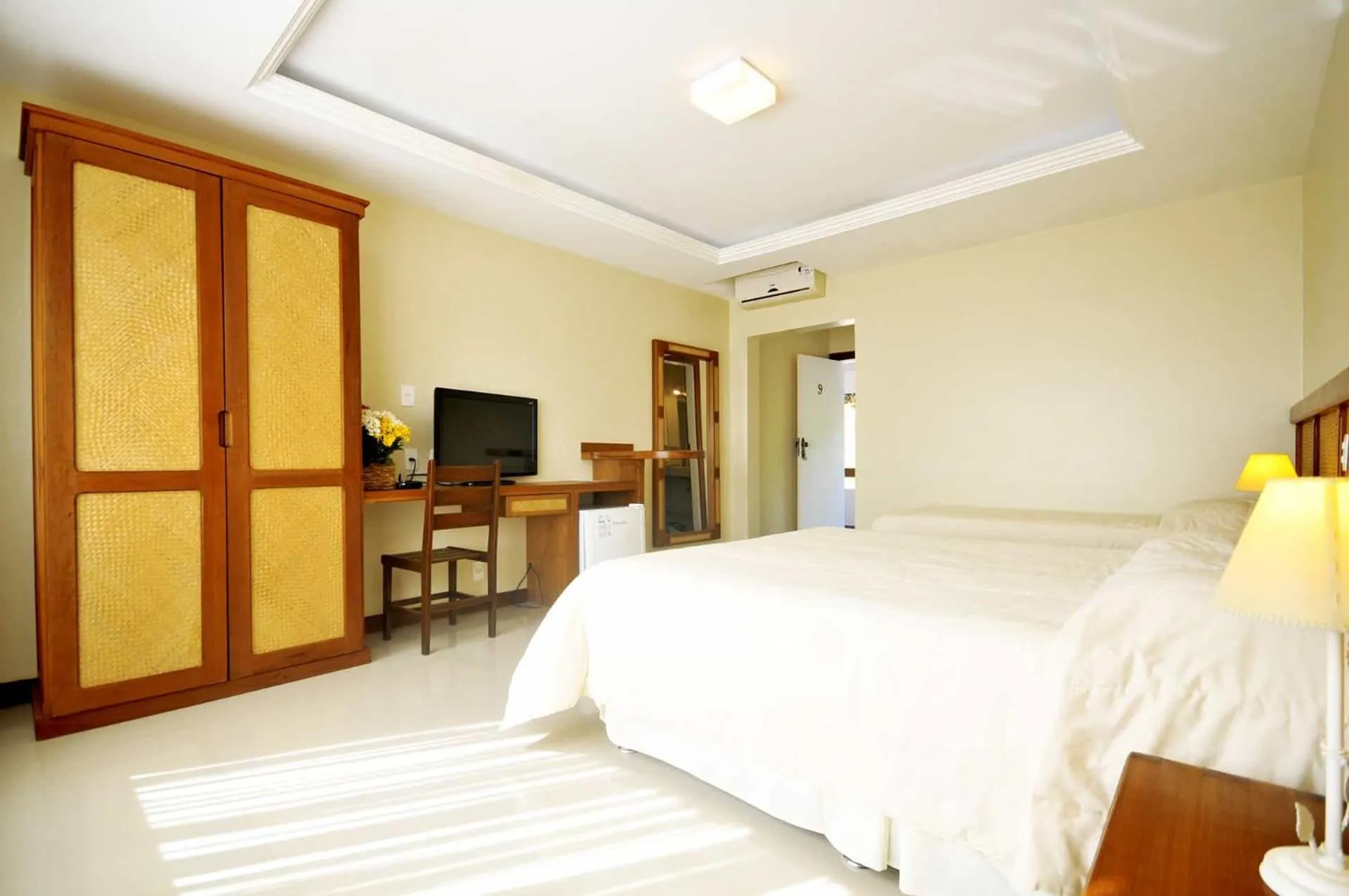 Bed in Pousada Pelicano