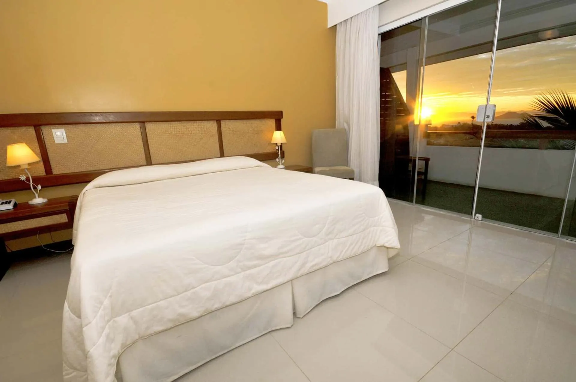 Bed in Pousada Pelicano