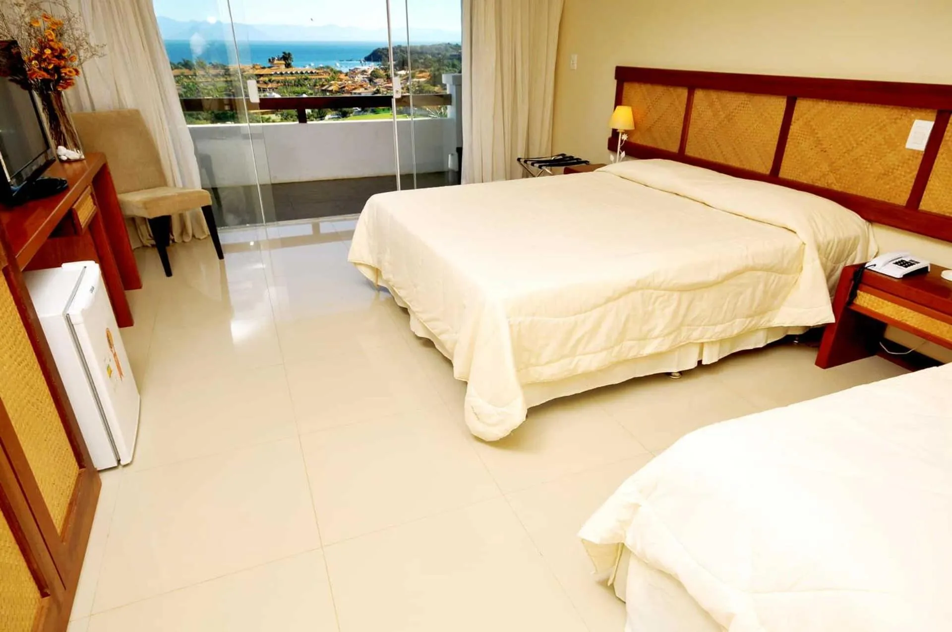 Bed in Pousada Pelicano