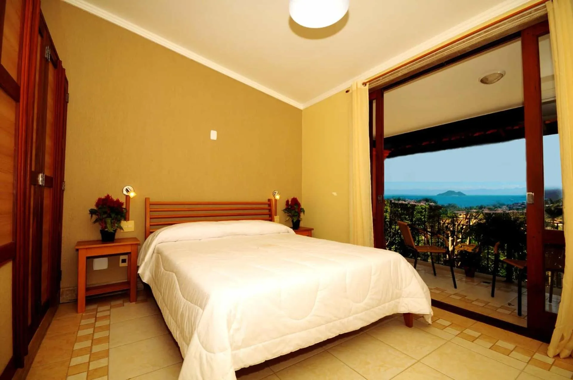 Bed in Pousada Pelicano