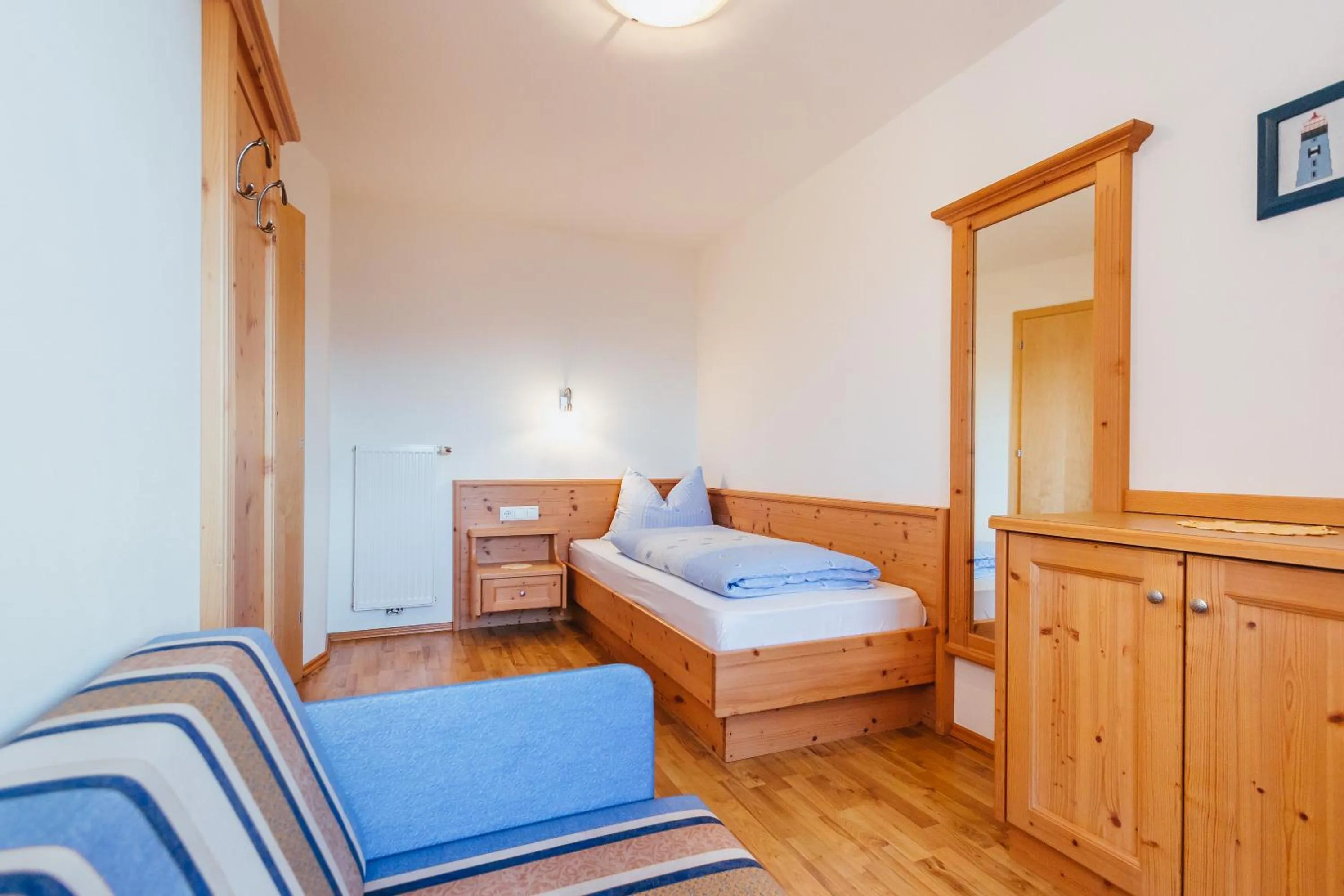 Photo of the whole room, Bed in Residence Speckerhof