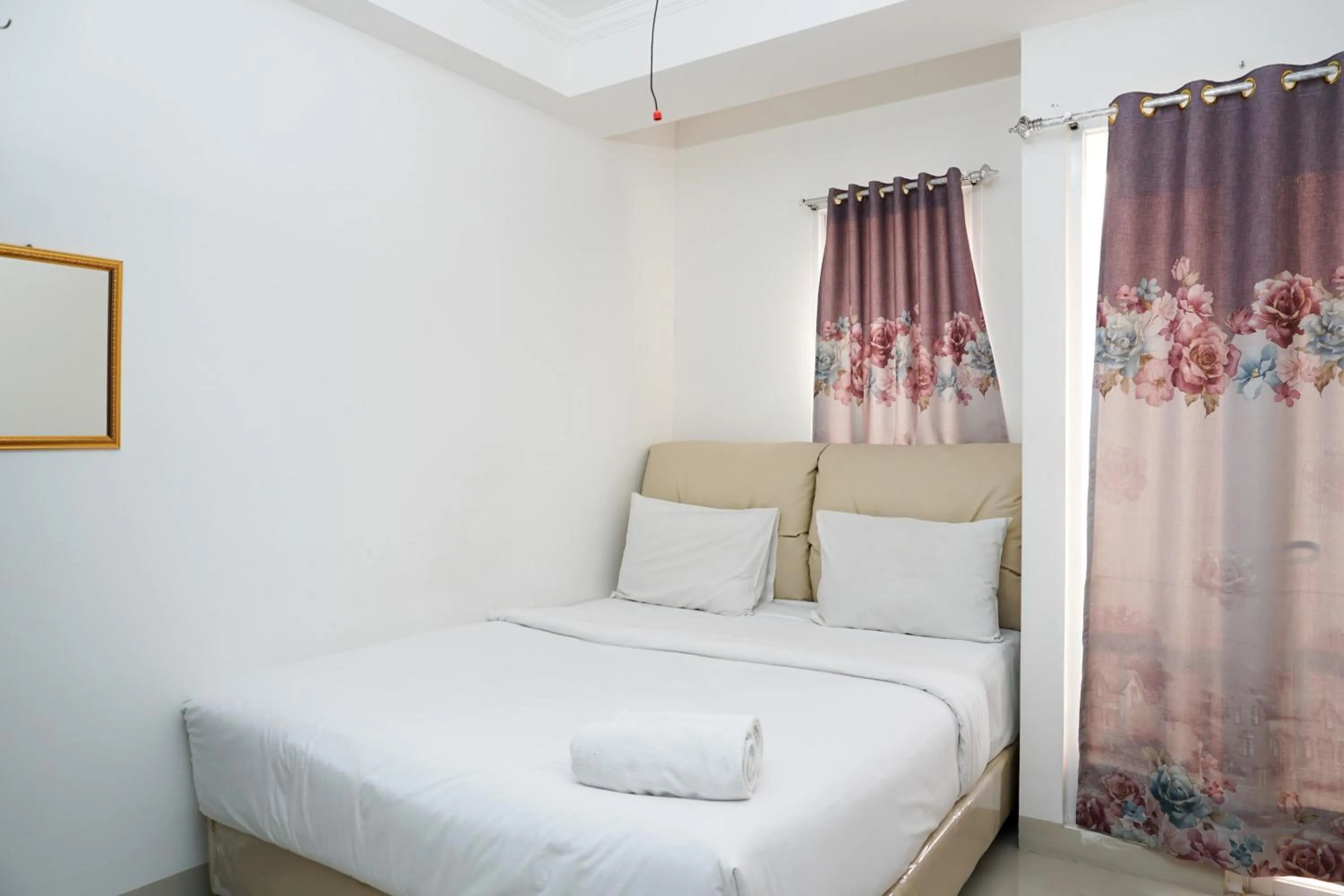 Bed in City View Studio Apartment at Signature Park Grande By Travelio