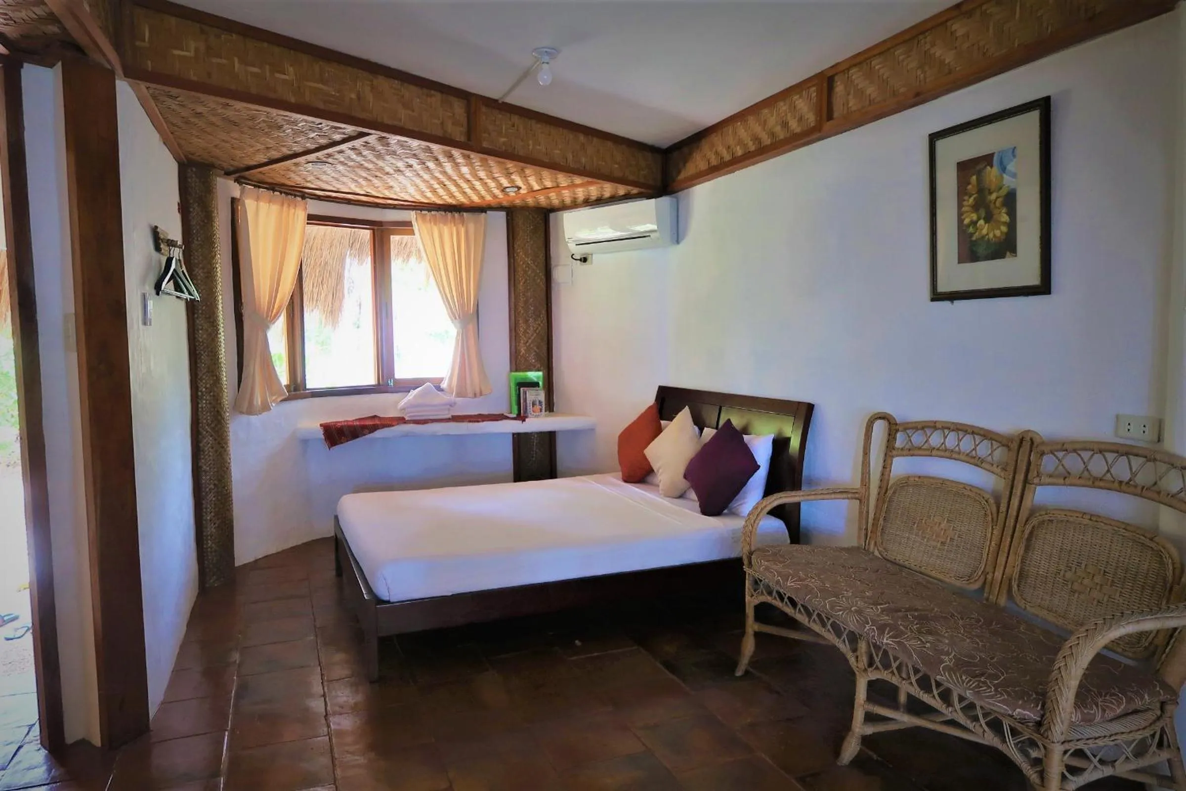 Bed in VILLA MARMARINE BEACH RESORT & RESTAURANT