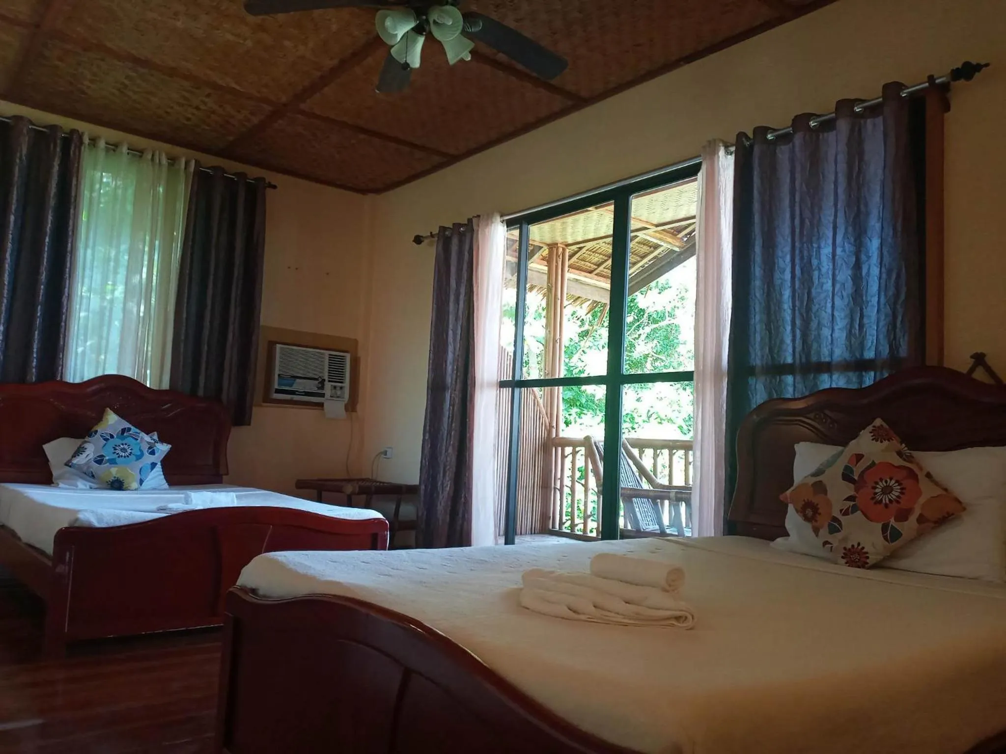 Bed in VILLA MARMARINE BEACH RESORT & RESTAURANT