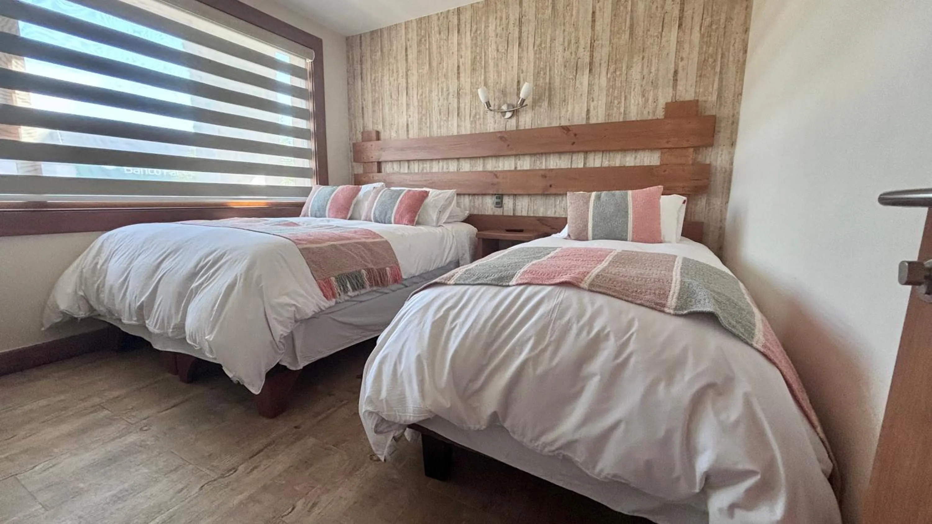Bed in Entre Cumbres Apart Hotel