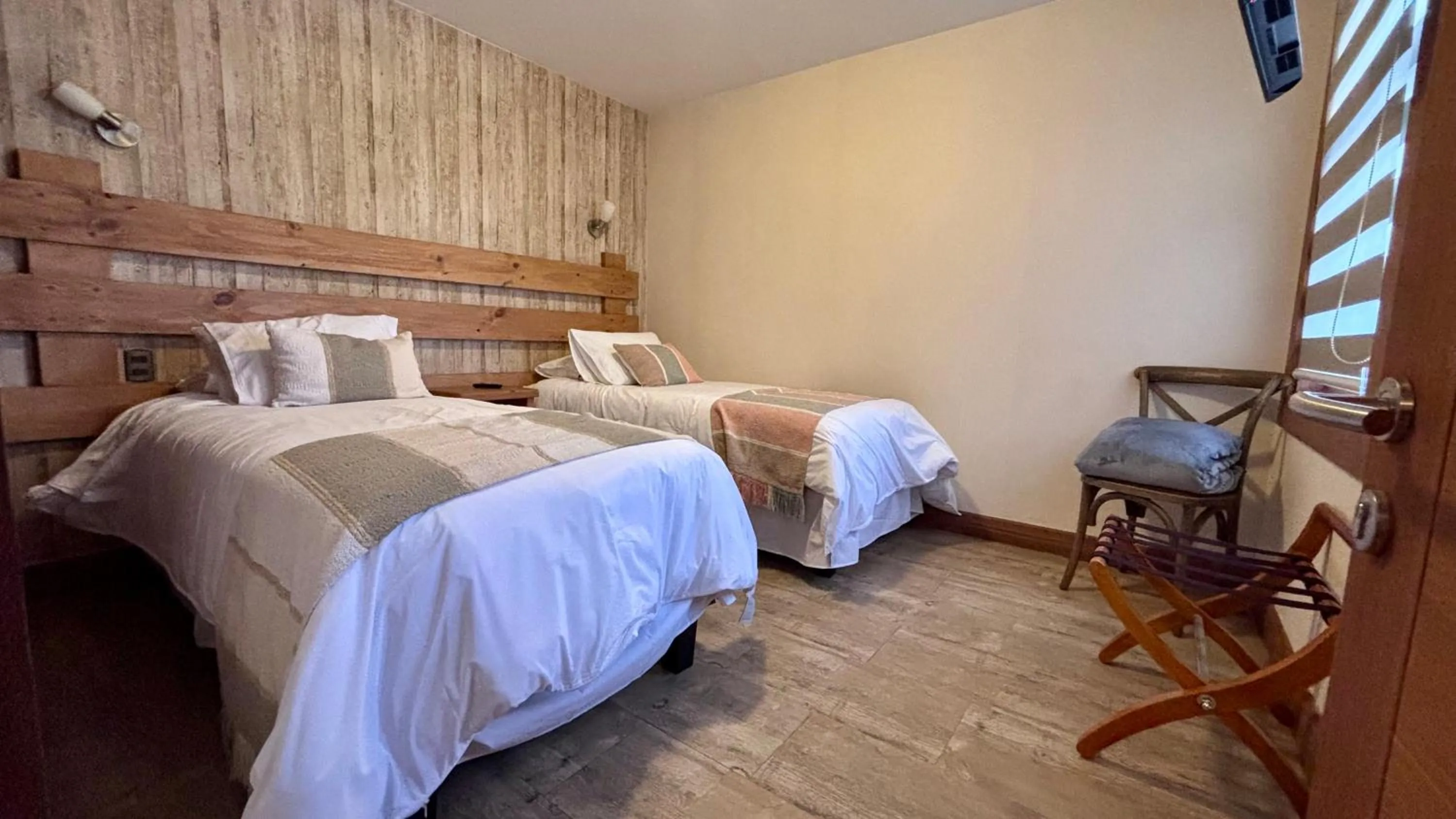 Bed in Entre Cumbres Apart Hotel