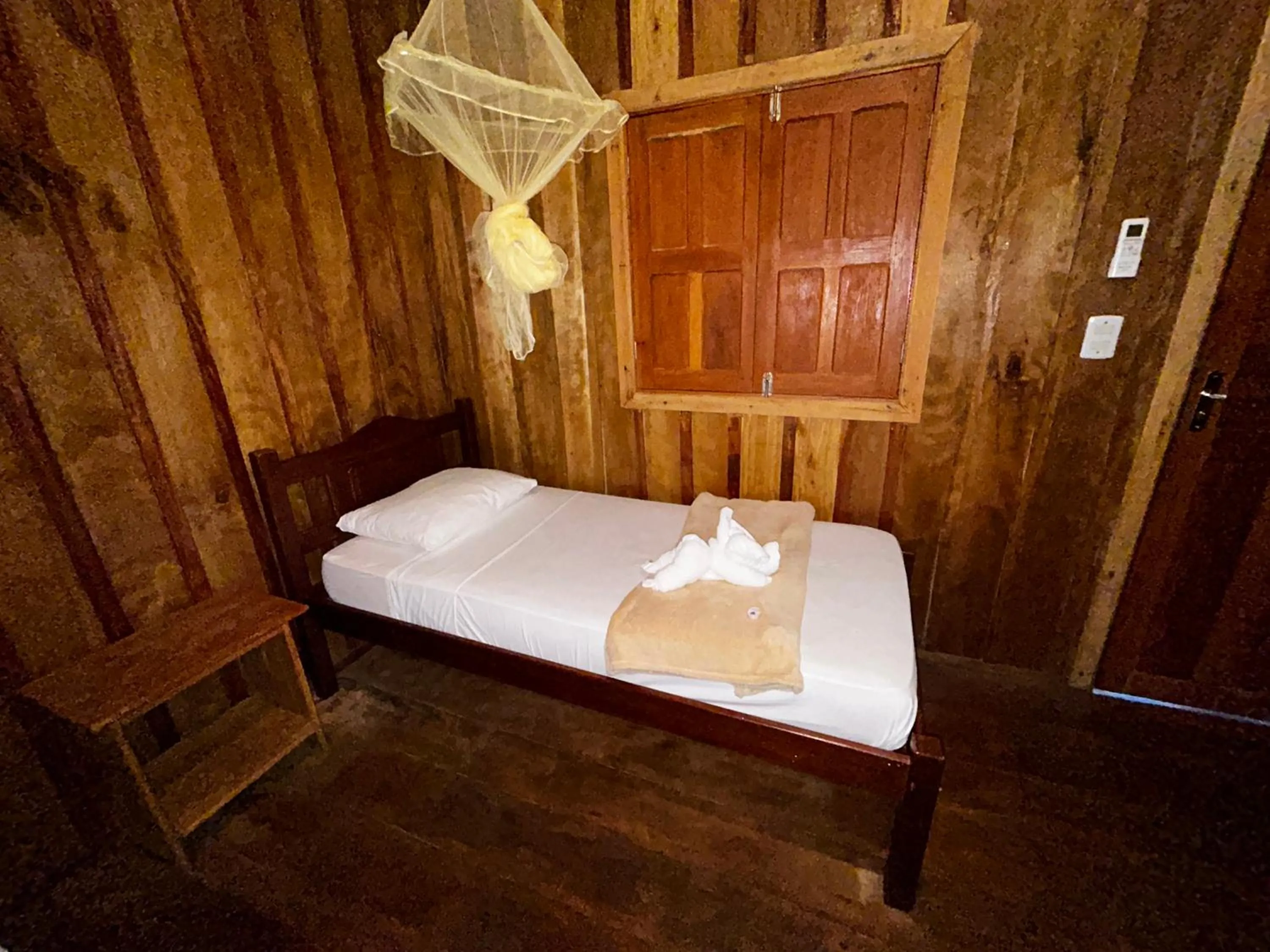 Bed in Vista do Lago Jungle Lodge