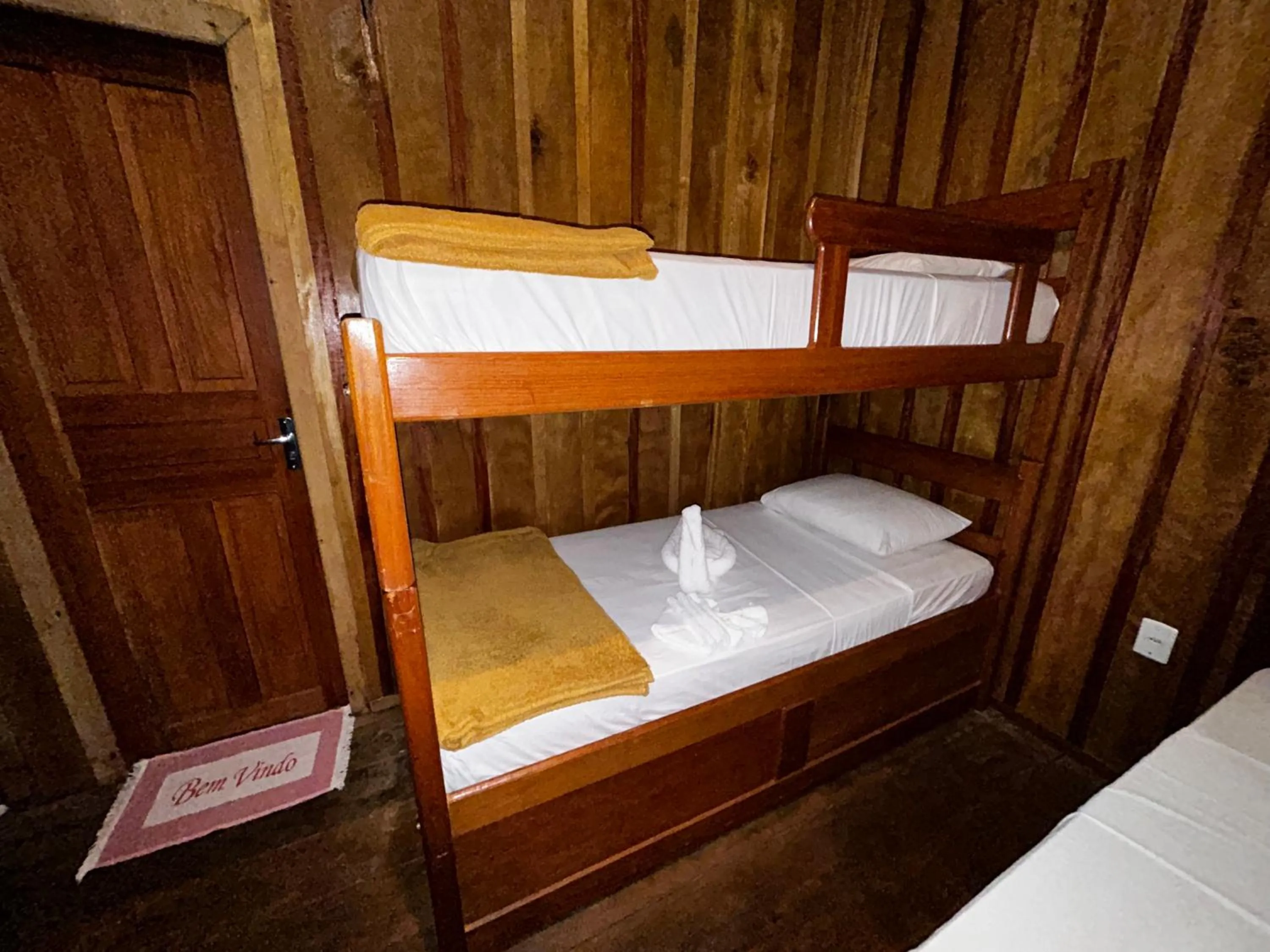 Bed in Vista do Lago Jungle Lodge