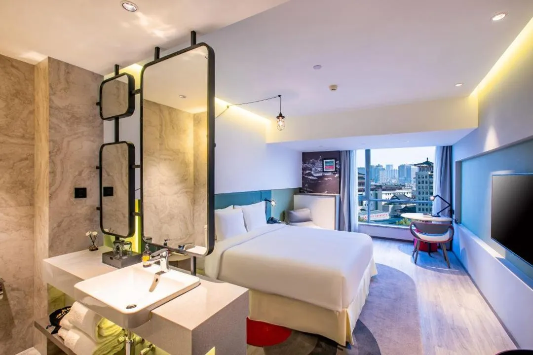 Bed in Jinmao Hotel Xi'an Downtown