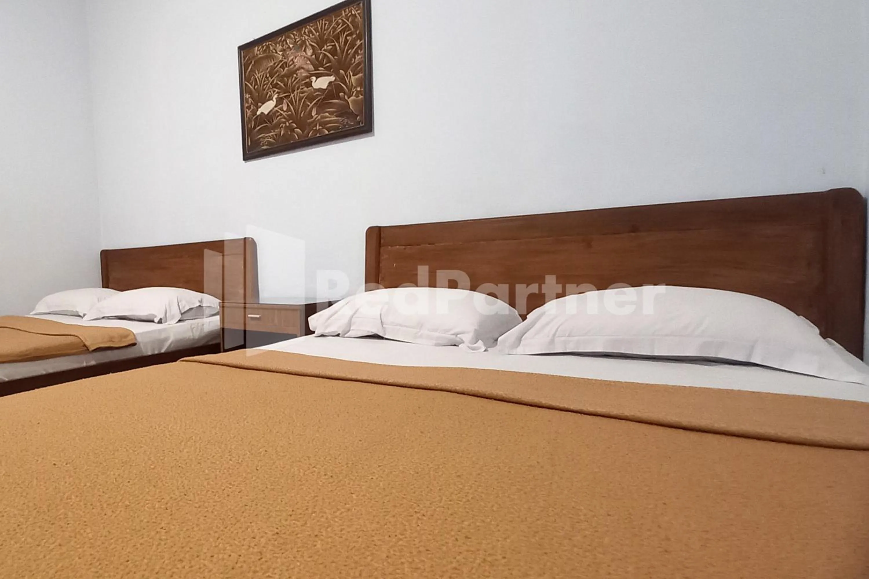 Bed in Hotel Palem 1 Syariah RedPartner