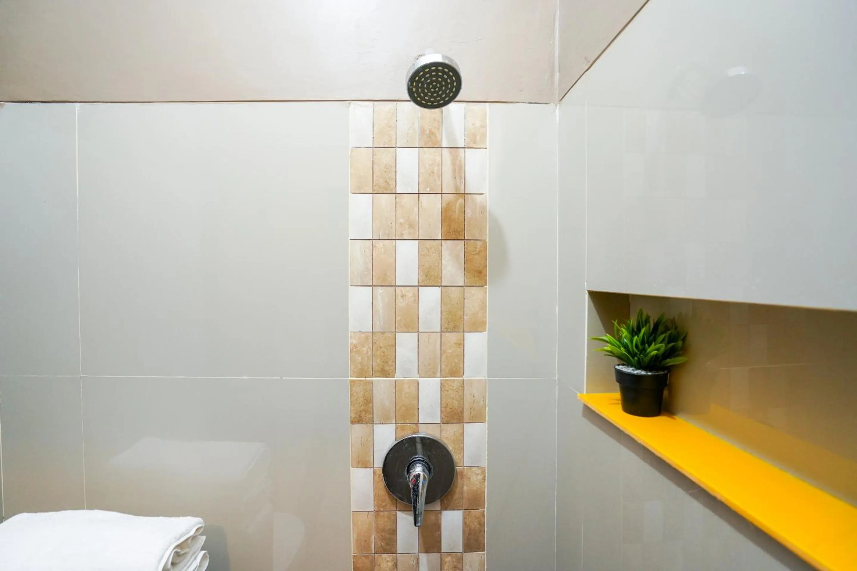 Bathroom in Hotel O Surabaya near Surabaya Town Square formerly Kupang Gunung Residence