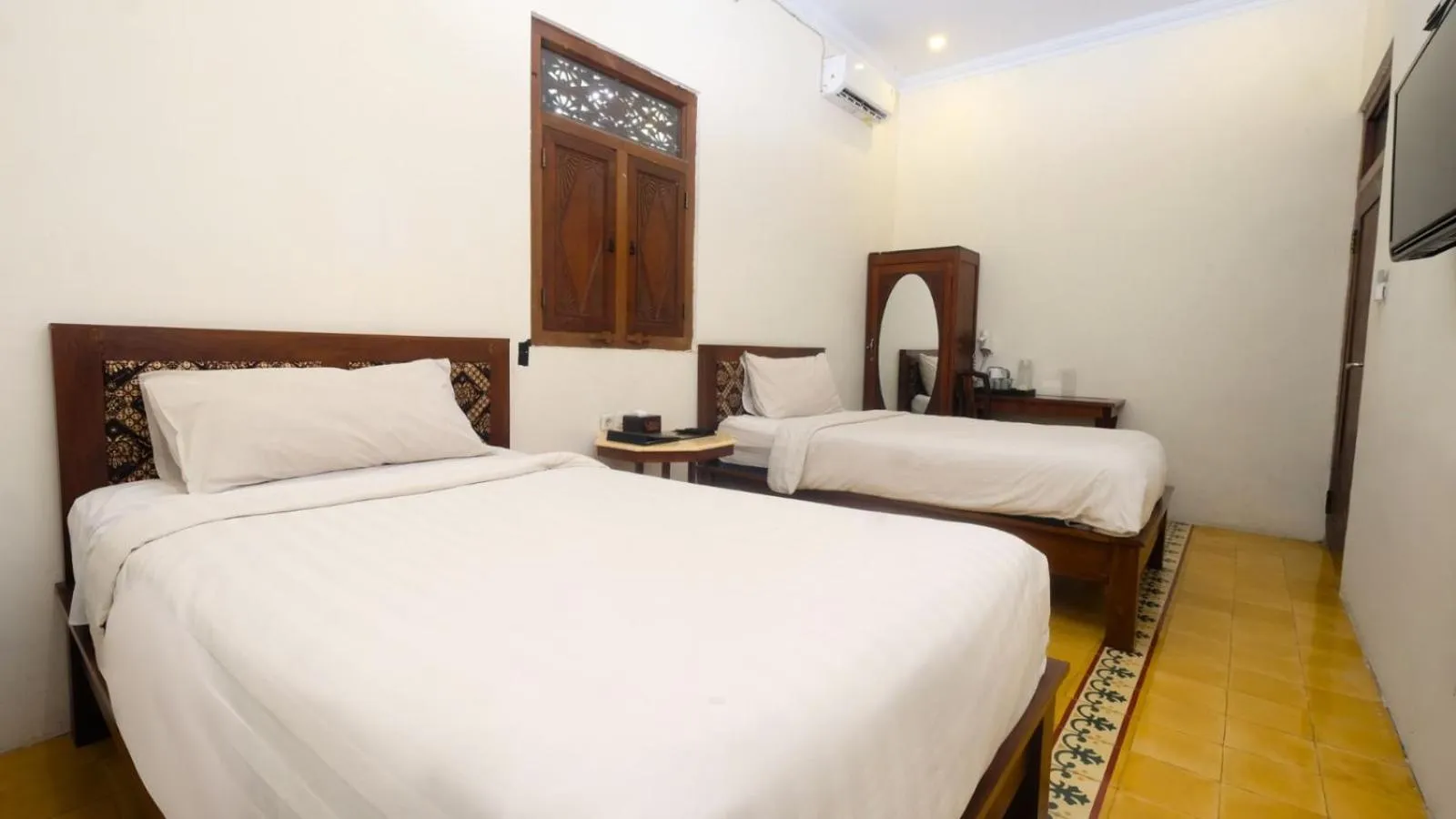 Bed in The Mangkoro Hotel by Sinergi