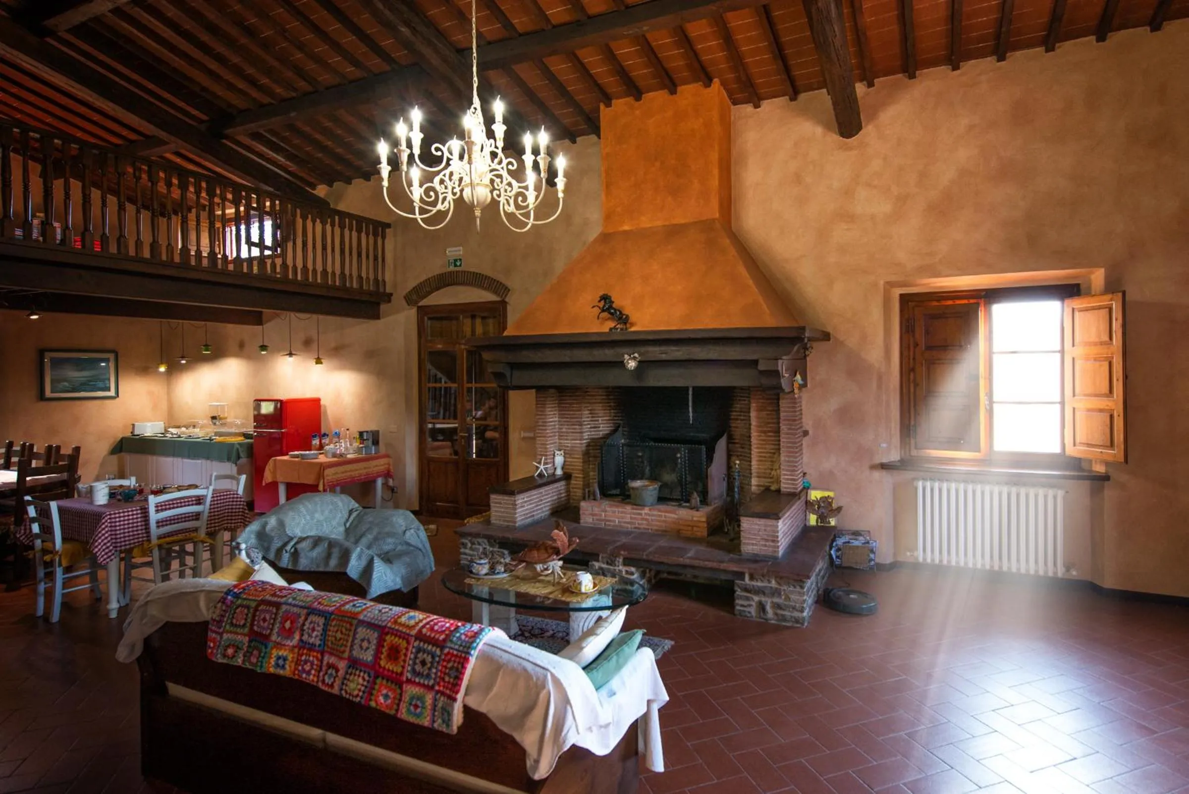 Communal lounge/ TV room in B&B CASALISA