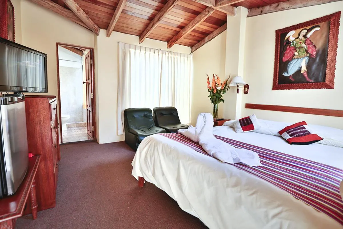 Photo of the whole room, Bed in Andean Dreams Hotel