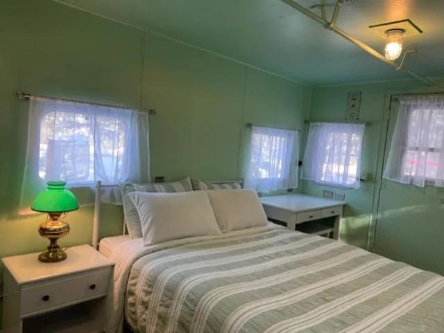 Bed in Glacier Haven Inn