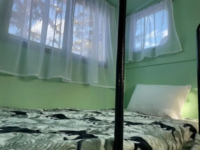 Bed in Glacier Haven Inn