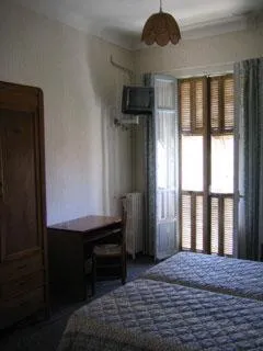Bedroom in Hotel Pierre Loti