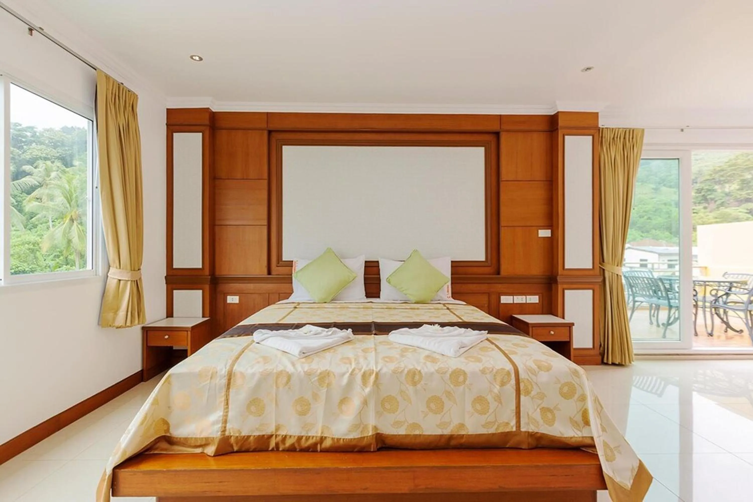 Bed in Sukcheewa Residence Phuket