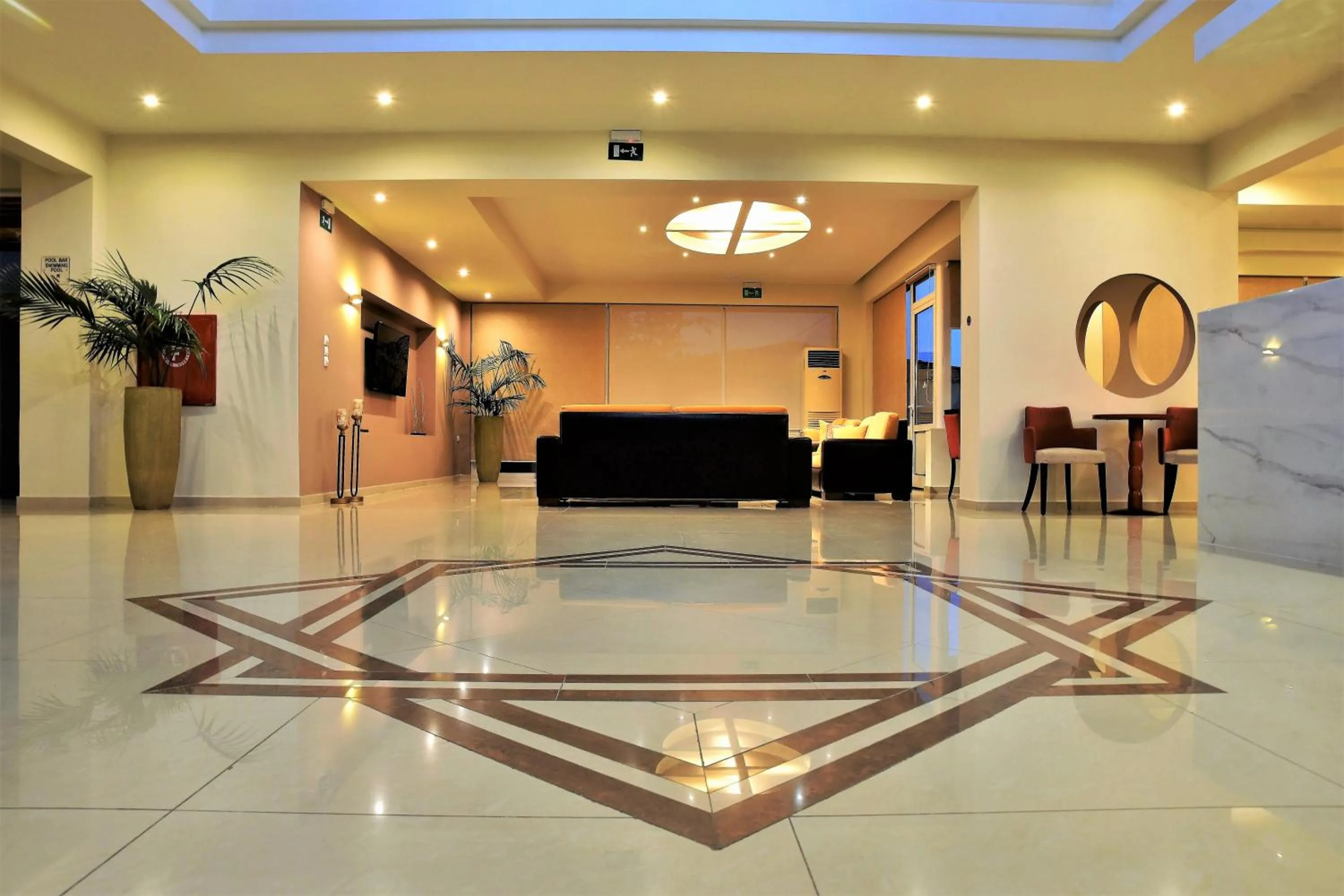 Communal lounge/ TV room in Eurohotel Theo Hotel