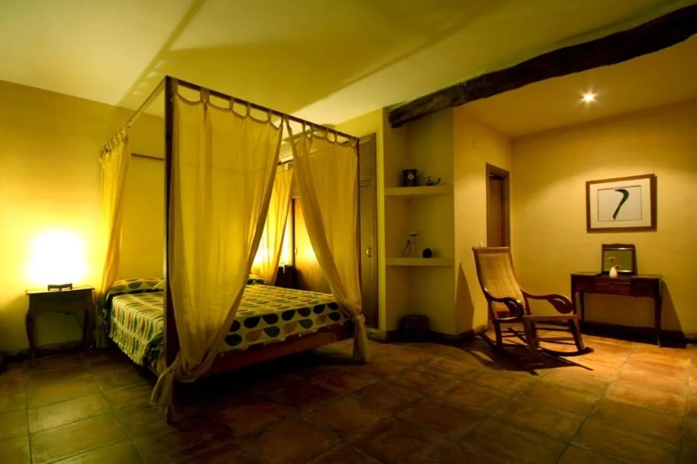 Bed in Posada Tresmentiras
