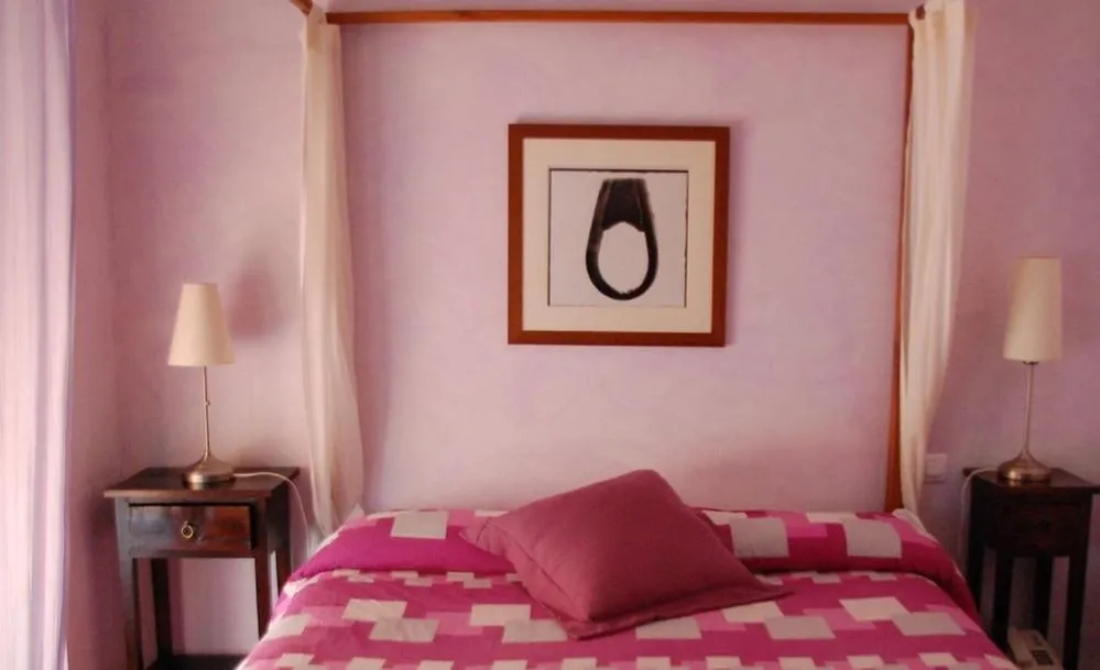 Bed in Posada Tresmentiras