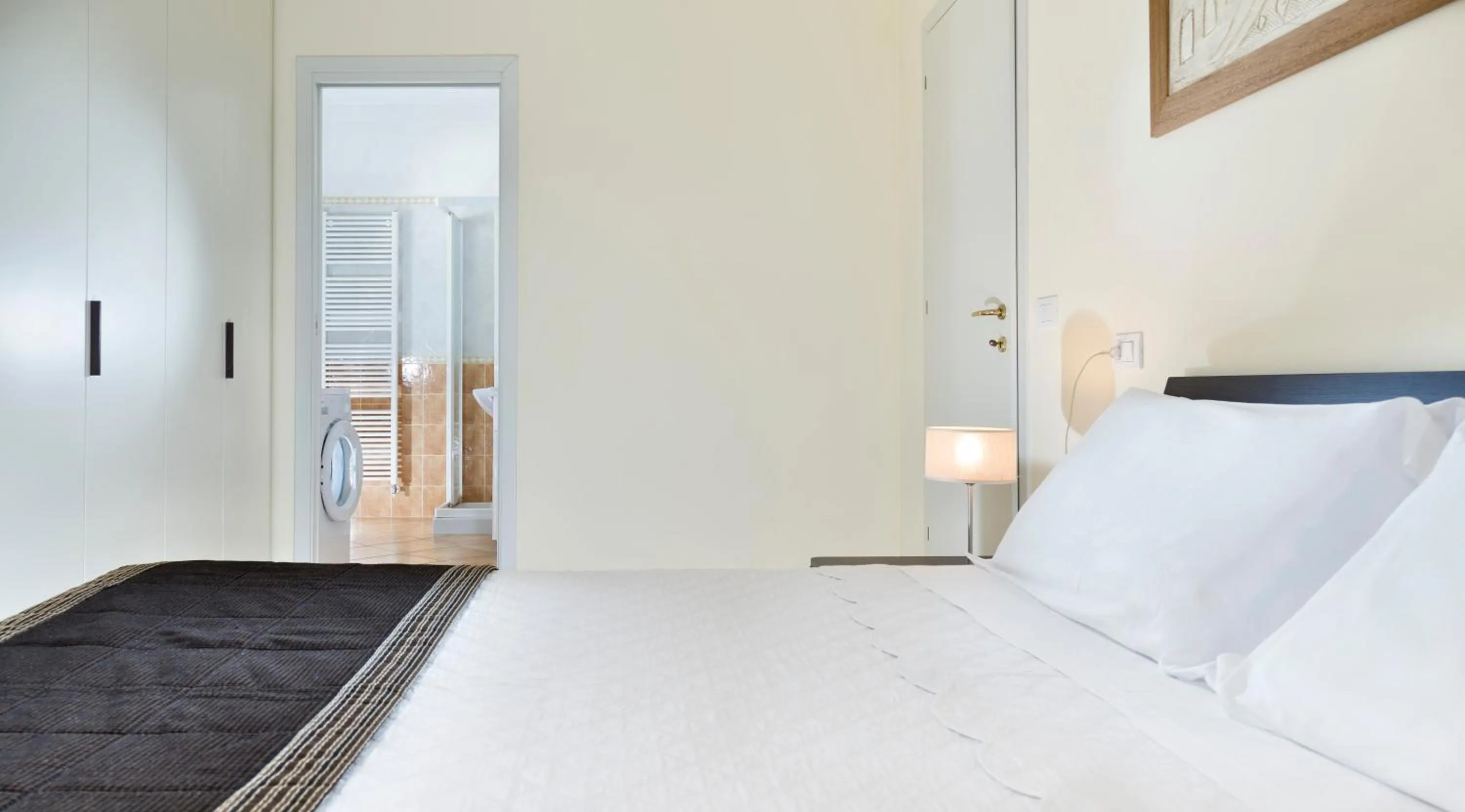 Bed in Portoverde Beach Apartments