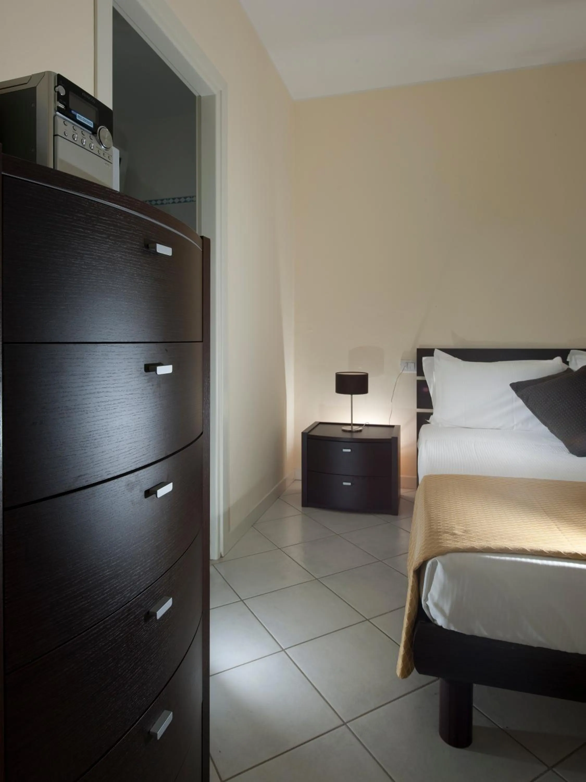 Decorative detail, Bed in Portoverde Beach Apartments
