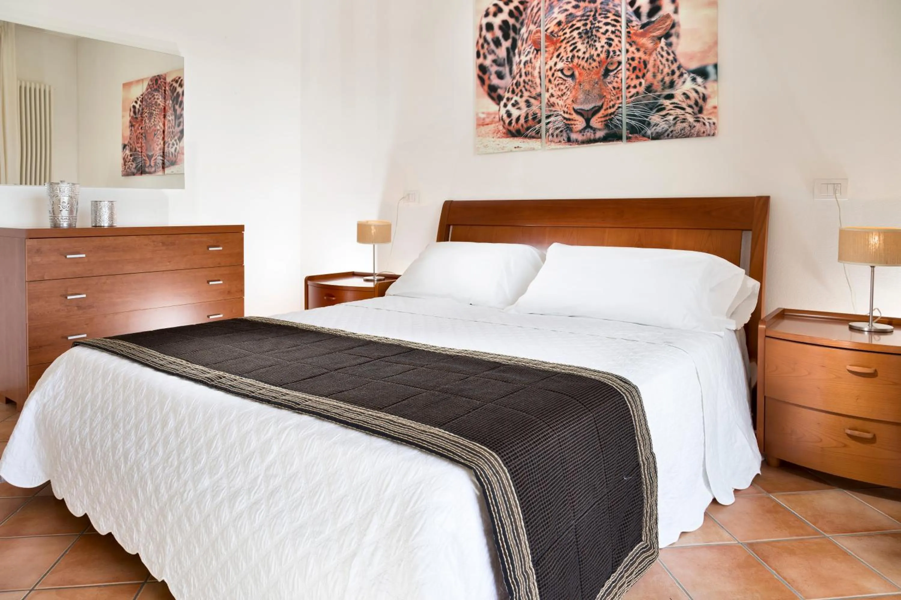 Bed in Portoverde Beach Apartments