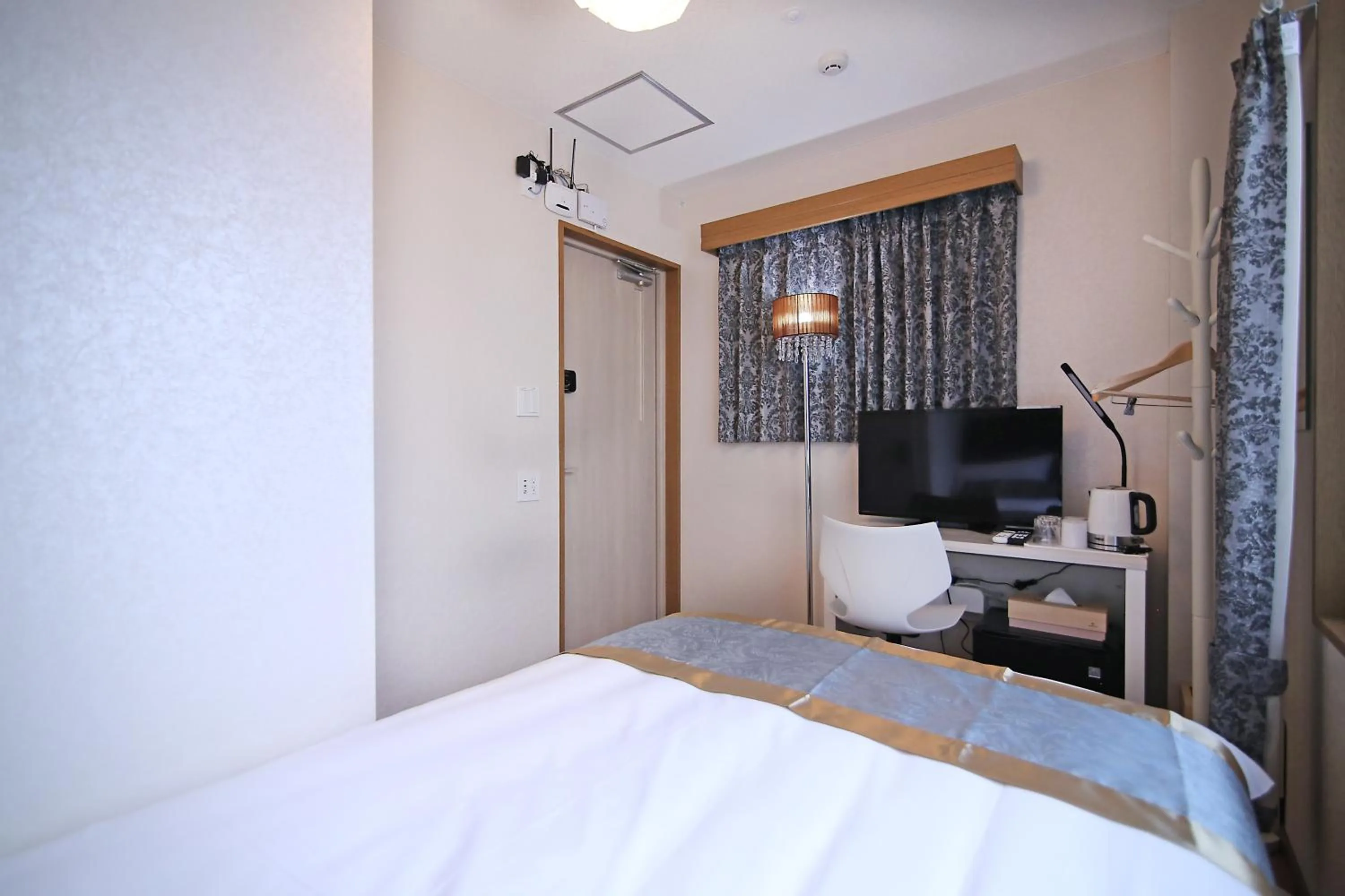 Bed in SHINJUKU GLOBAL HOTEL