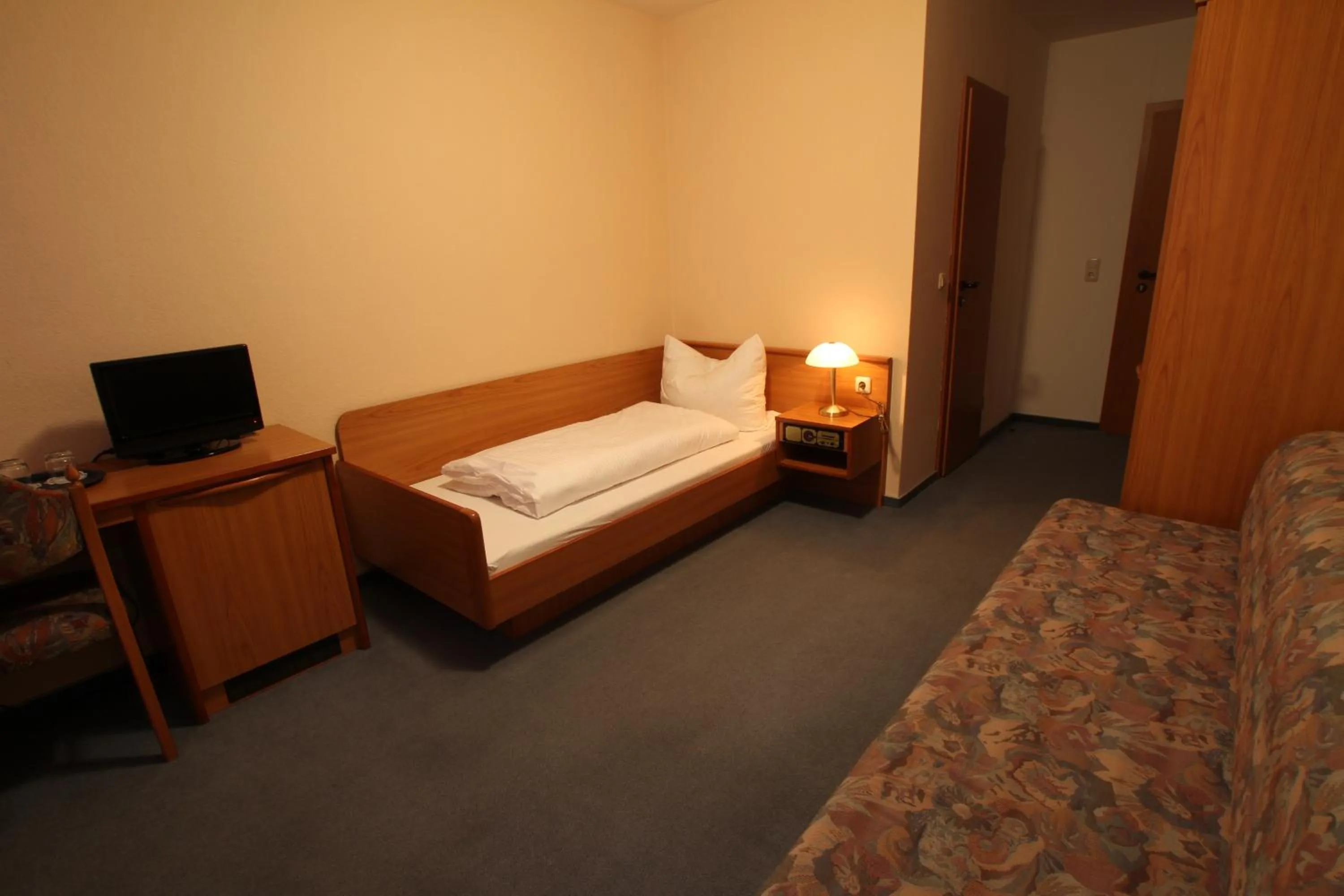 Photo of the whole room, Bed in Hotel Weisse Taube