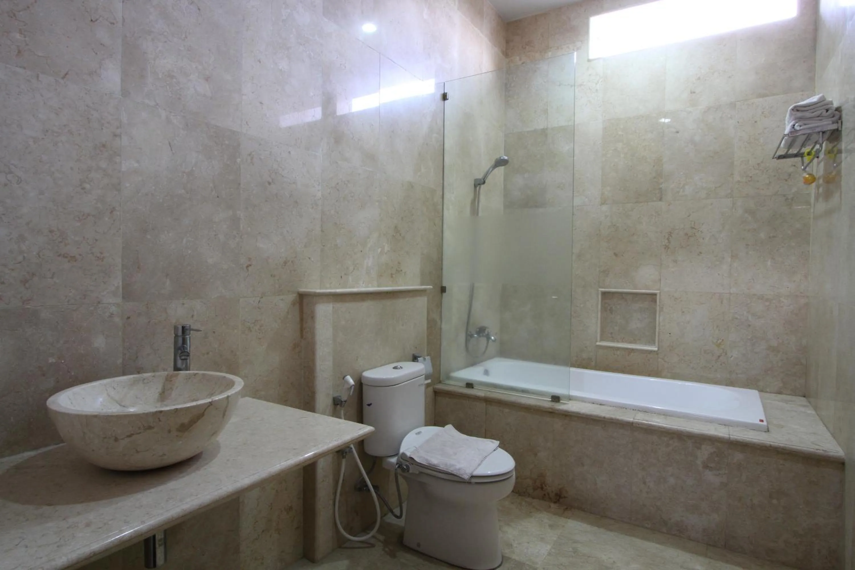 Bathroom in griya desa hotel & pool