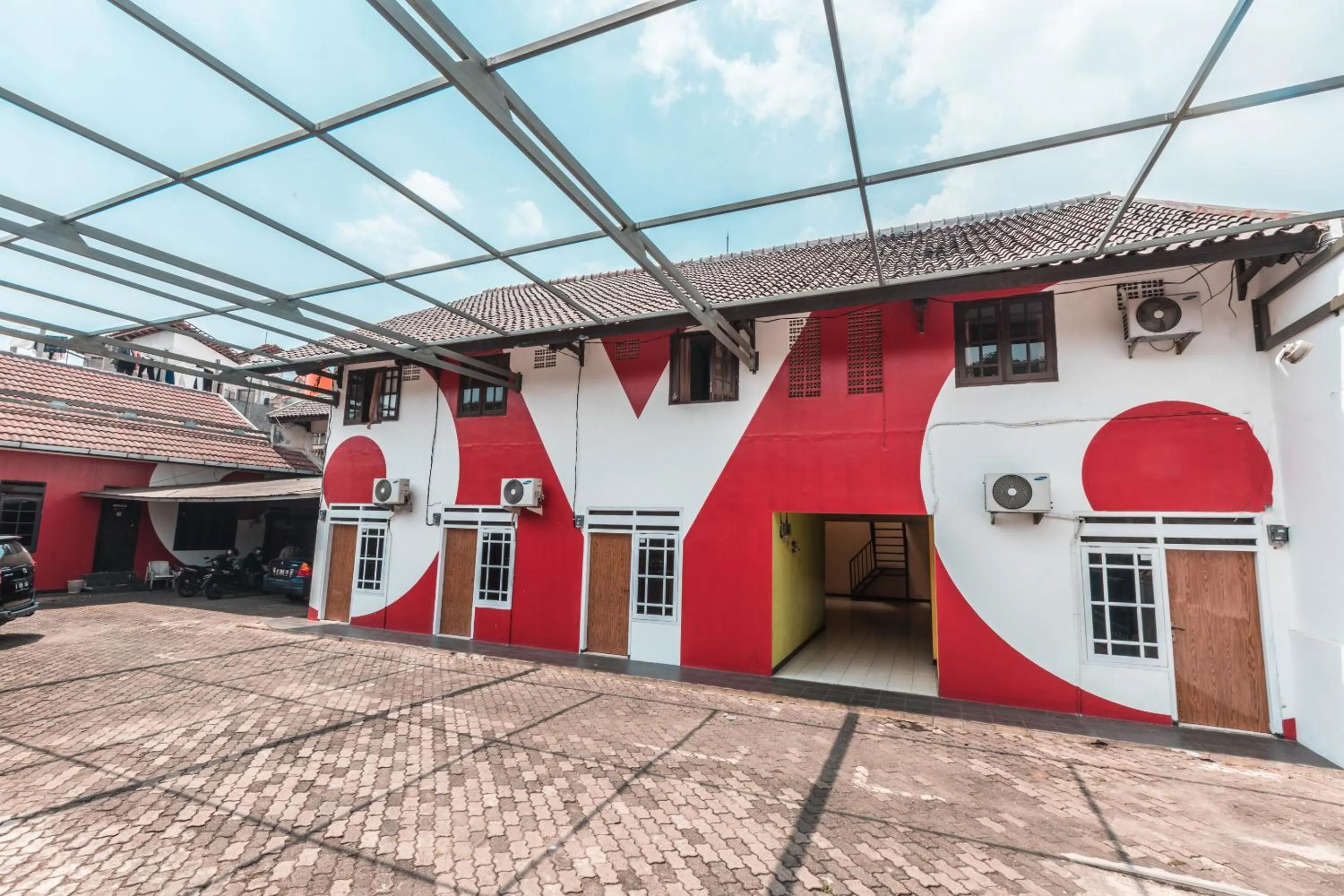 Facade/entrance in OYO 947 Angel Home Stay Syariah Near Atrium Pondok Gede, Museum Monumen Pancasila, Taman Mini