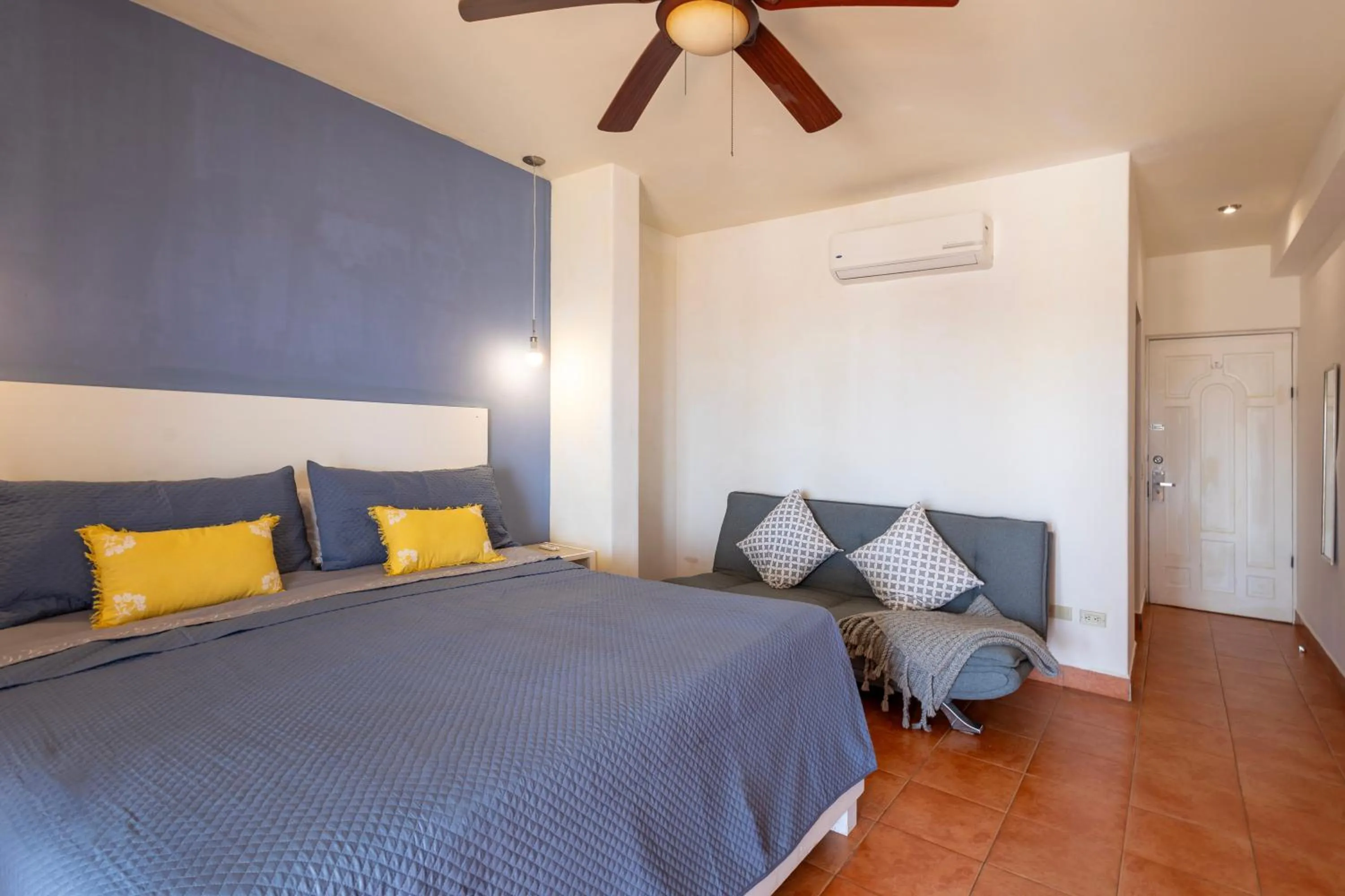 Bed in MariaMar Suites