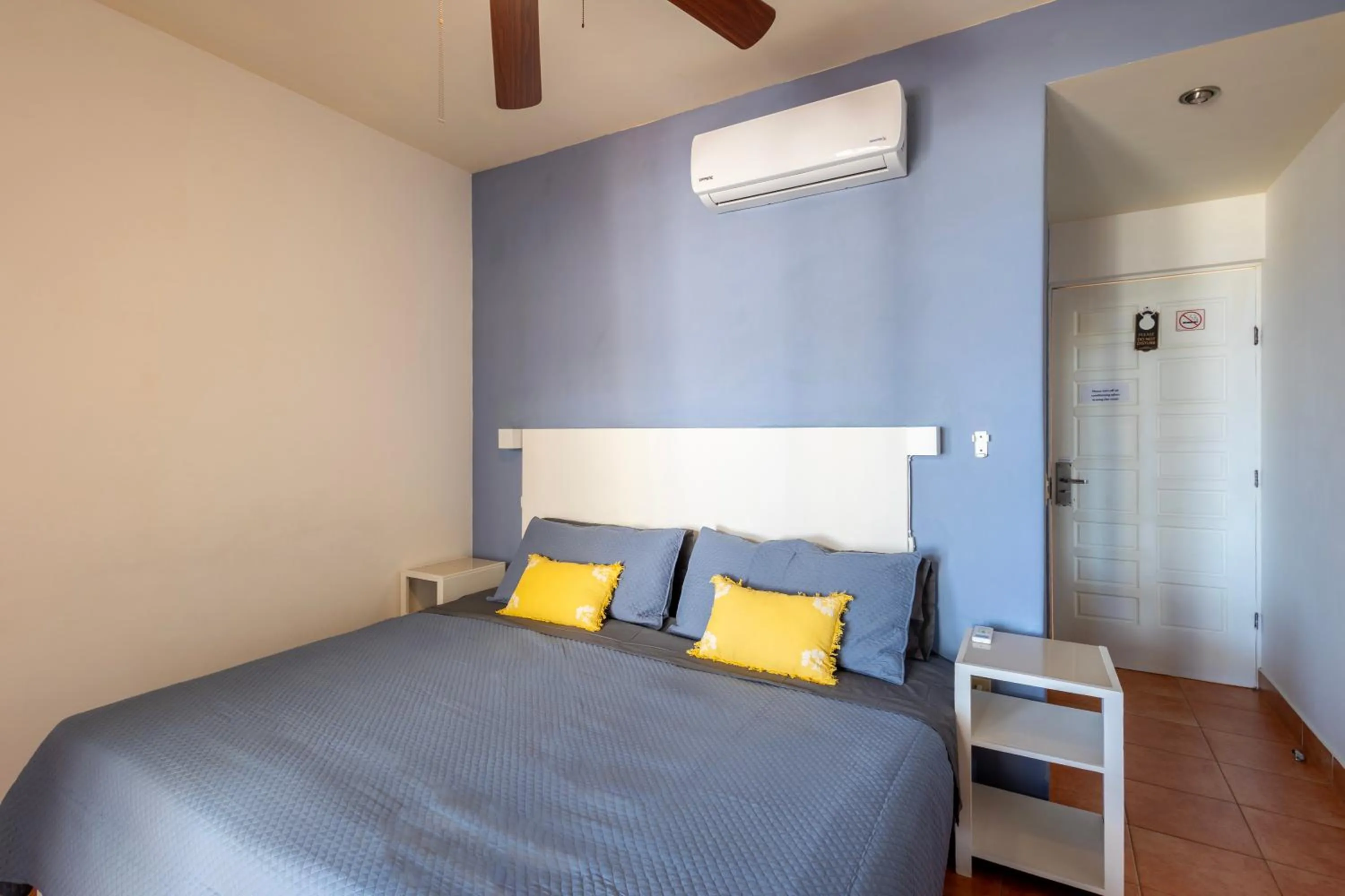 Bed in MariaMar Suites