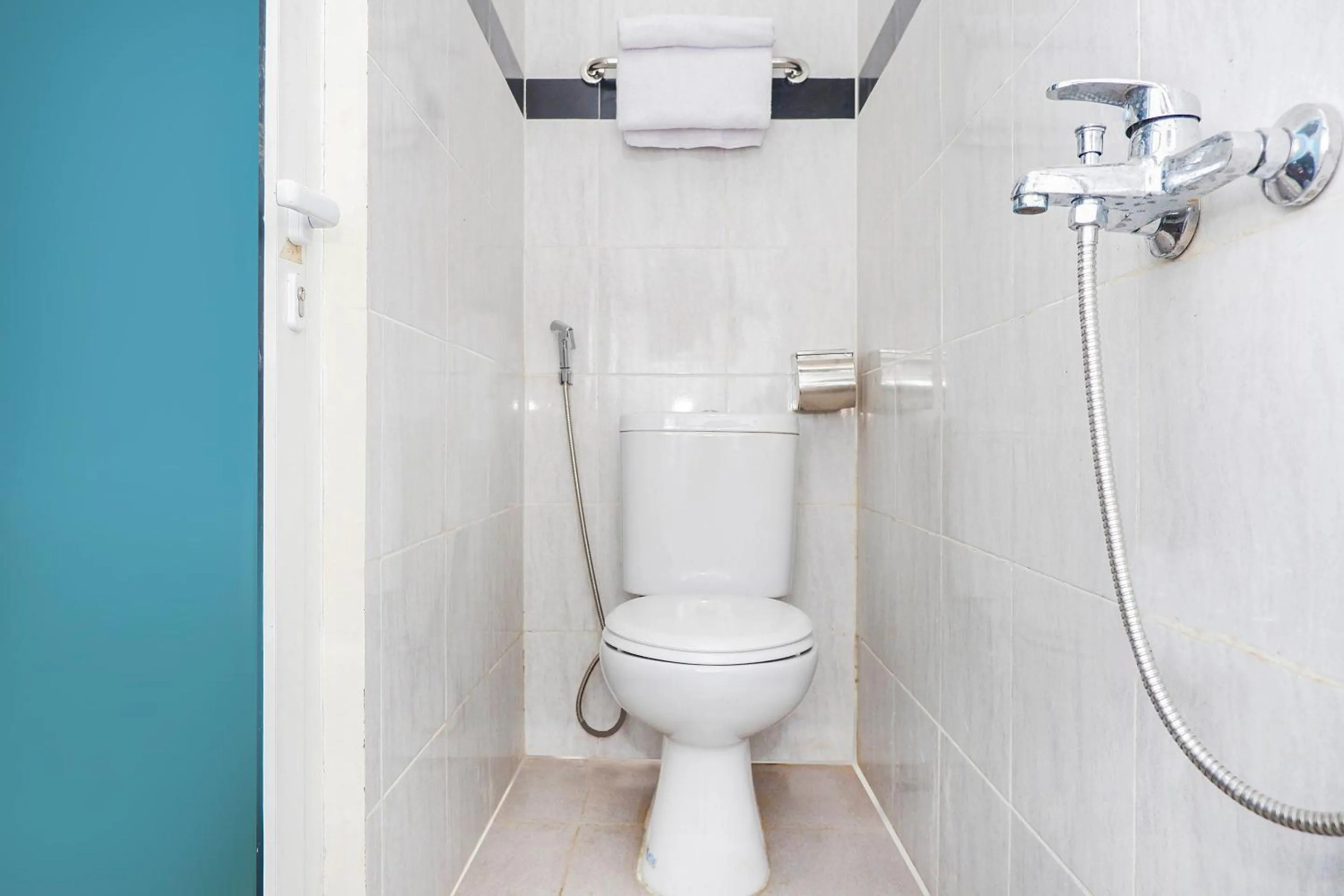 Bathroom in Hotel O Candi Residence