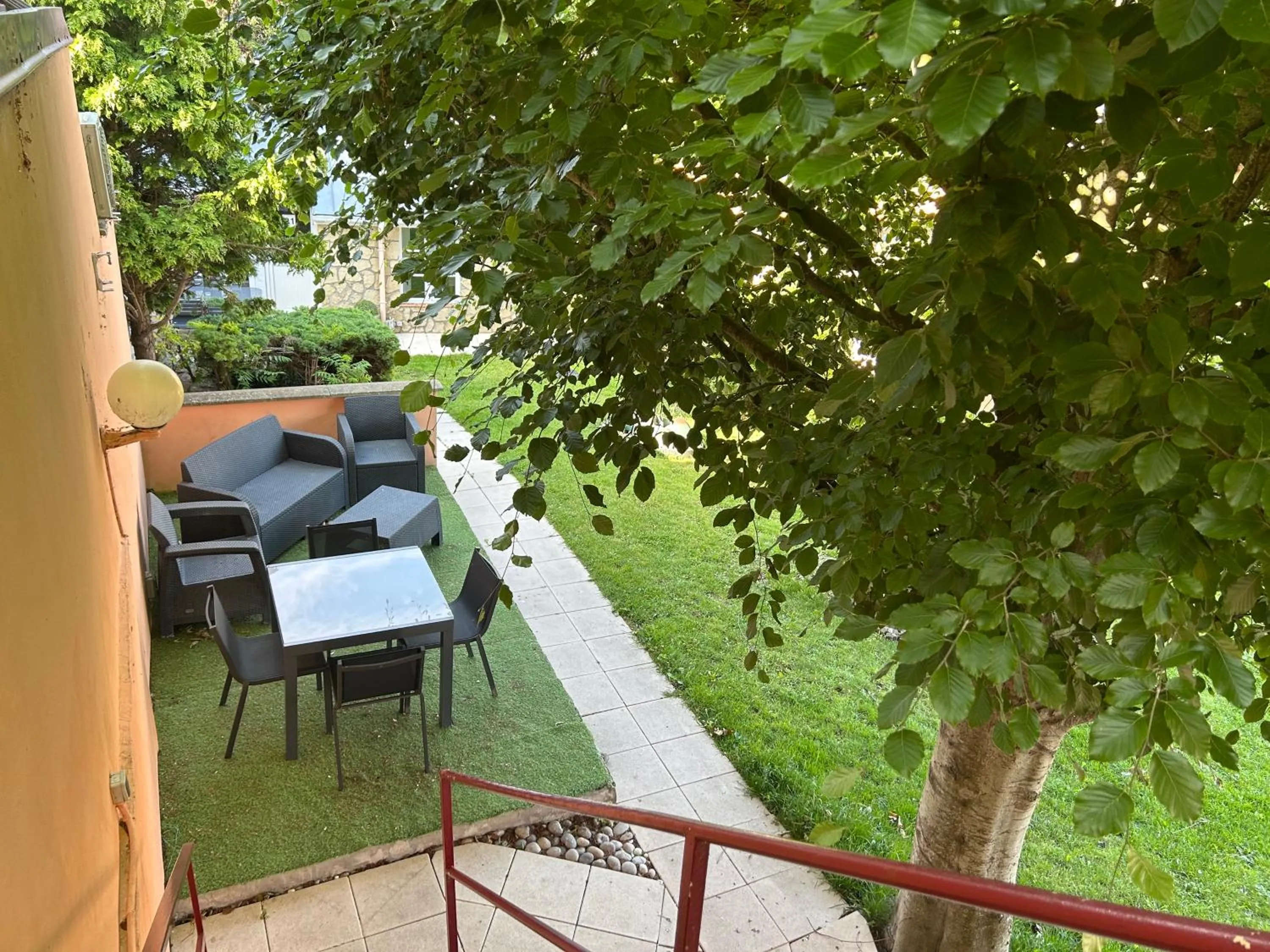 Garden view in Hôtel et Appart 'hôtel Chez Gino ETAPLES-Le Touquet