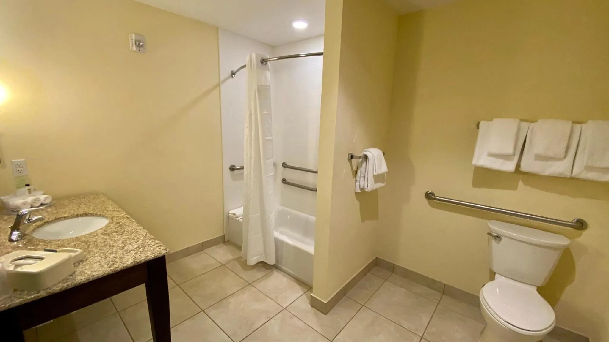 Bathroom in Holiday Inn Express Hotel & Suites Orlando East-UCF Area by IHG