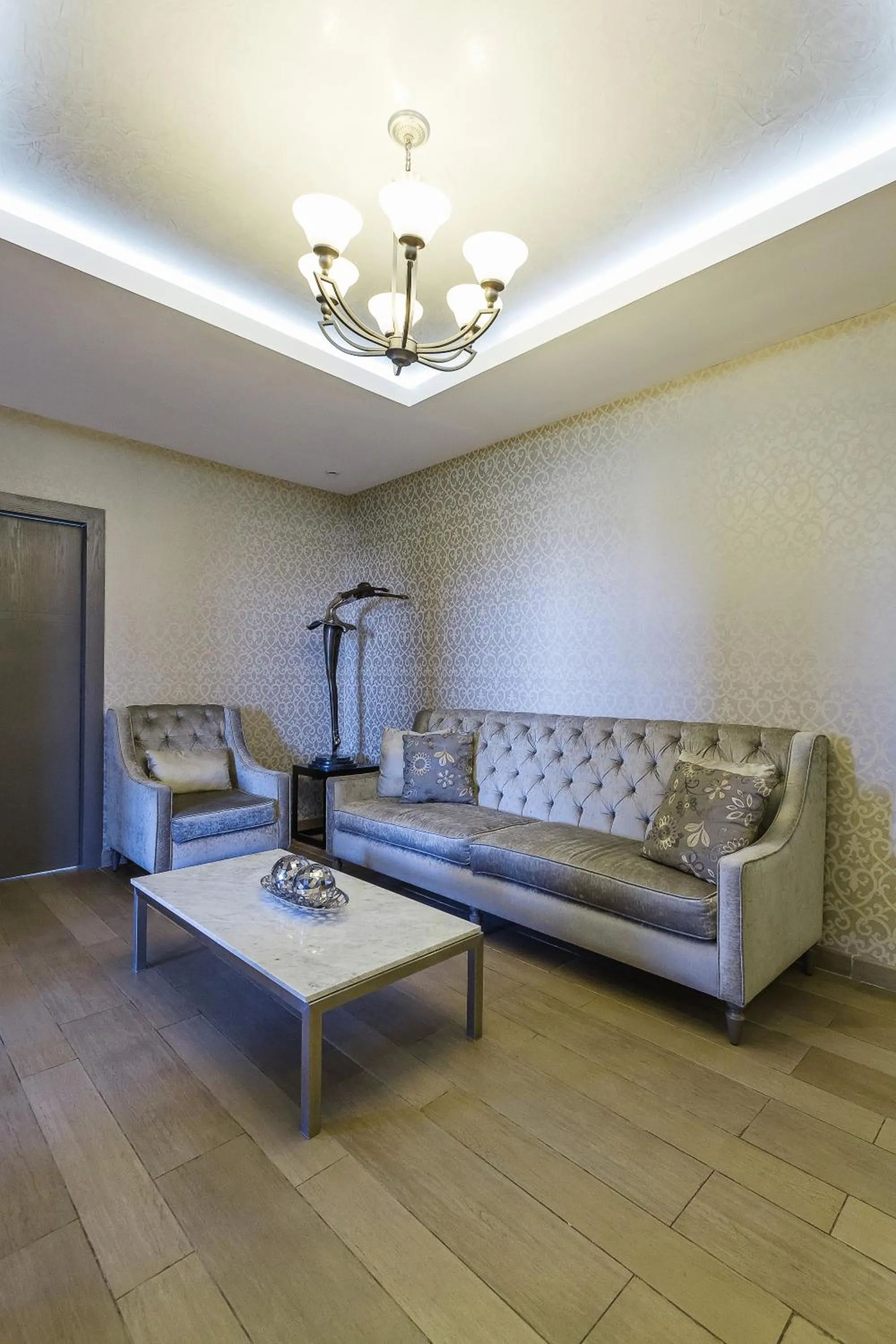 Living room in Hotel El Conquistador del Paseo de Montejo