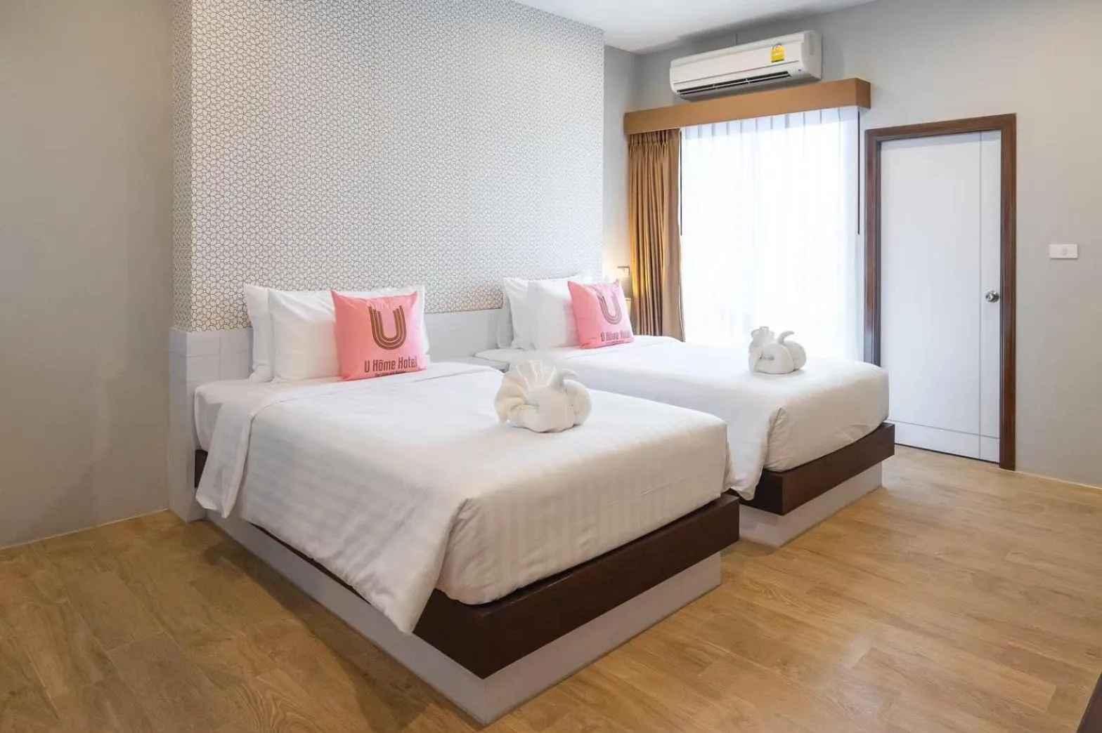 Bed in U- Homehotel Nakhonpanom