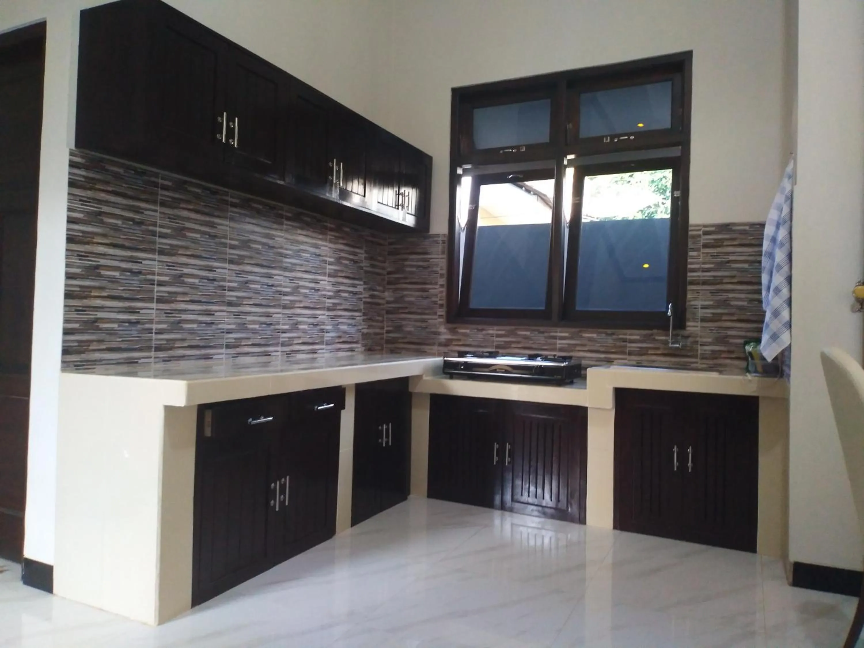 Kitchen or kitchenette in Homestay Purbalingga Tengah Kota by Simply Homy
