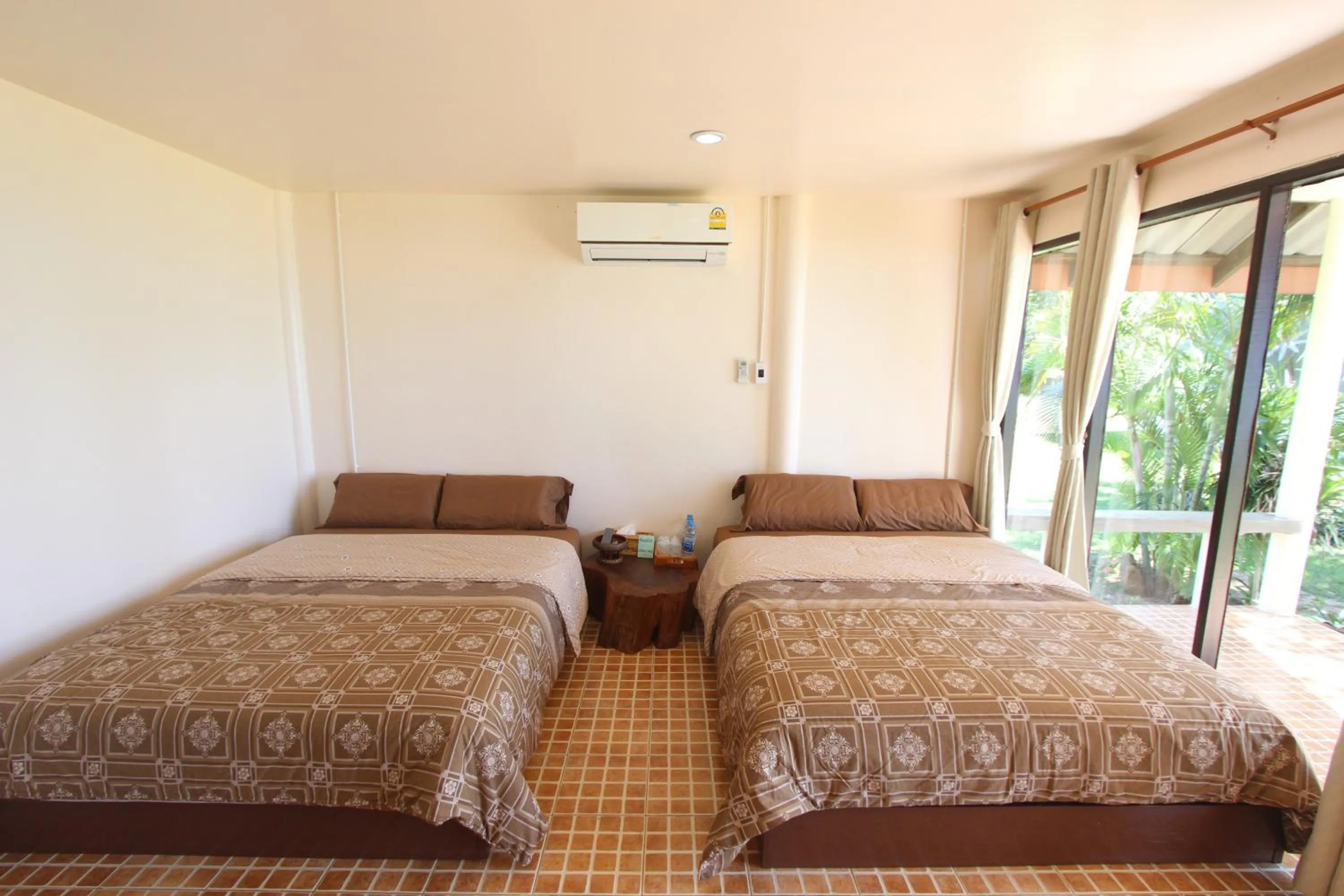 Bed in TK Beach Resort Koh Mak