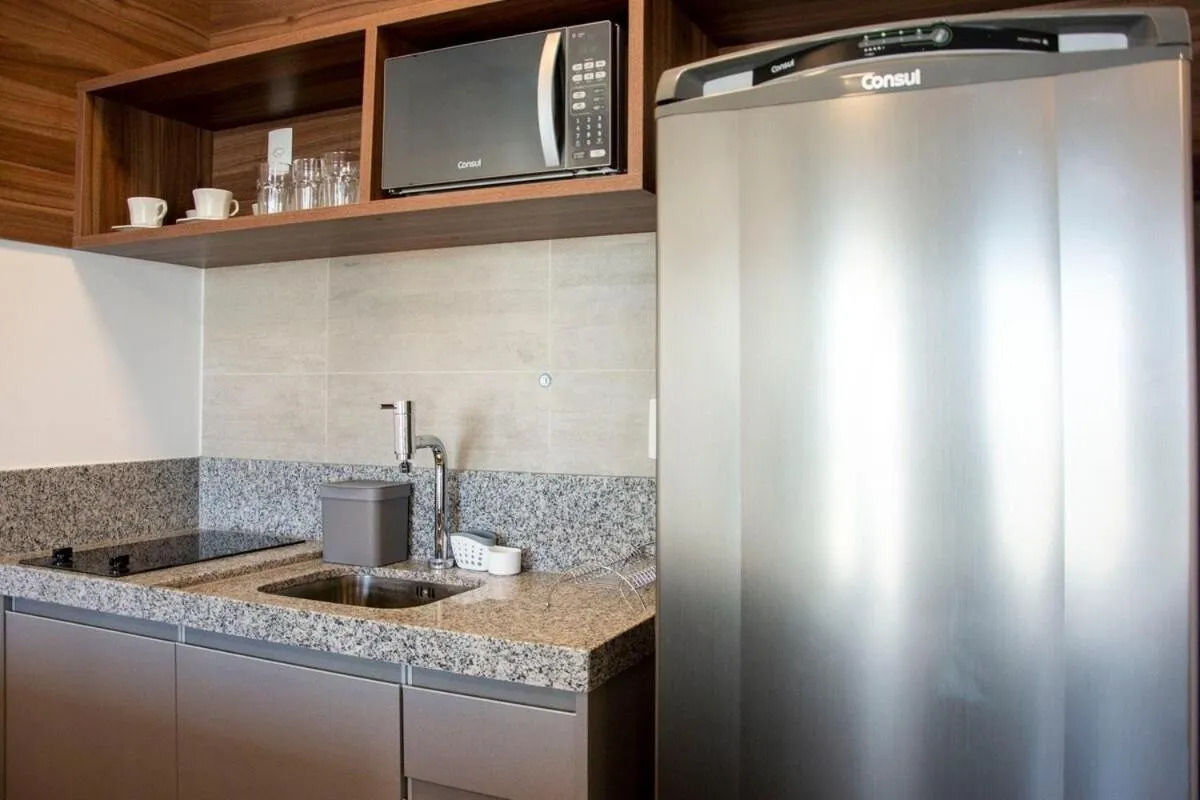 Kitchen or kitchenette in Nun Apartments by BnbHost