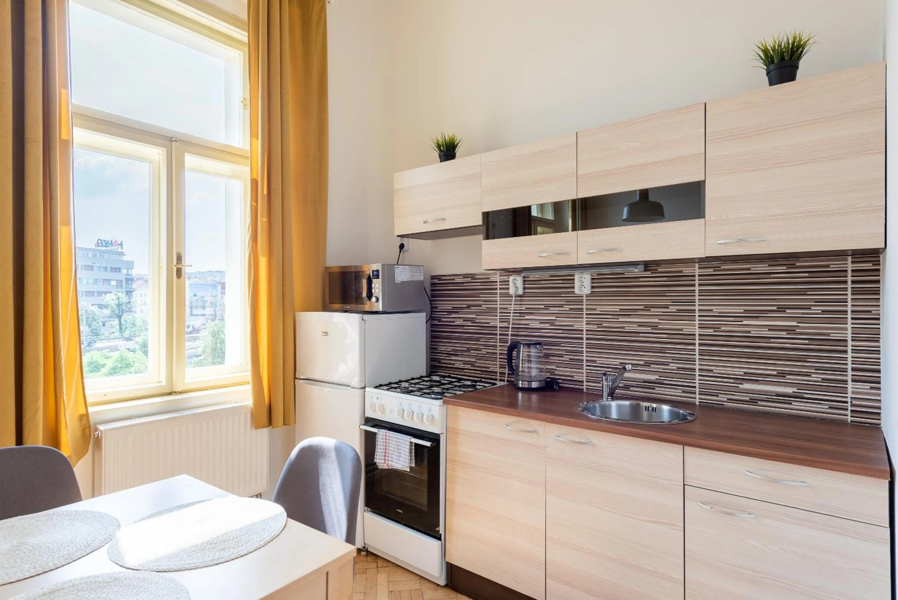 Kitchen or kitchenette in Tesnov Residence Apartments