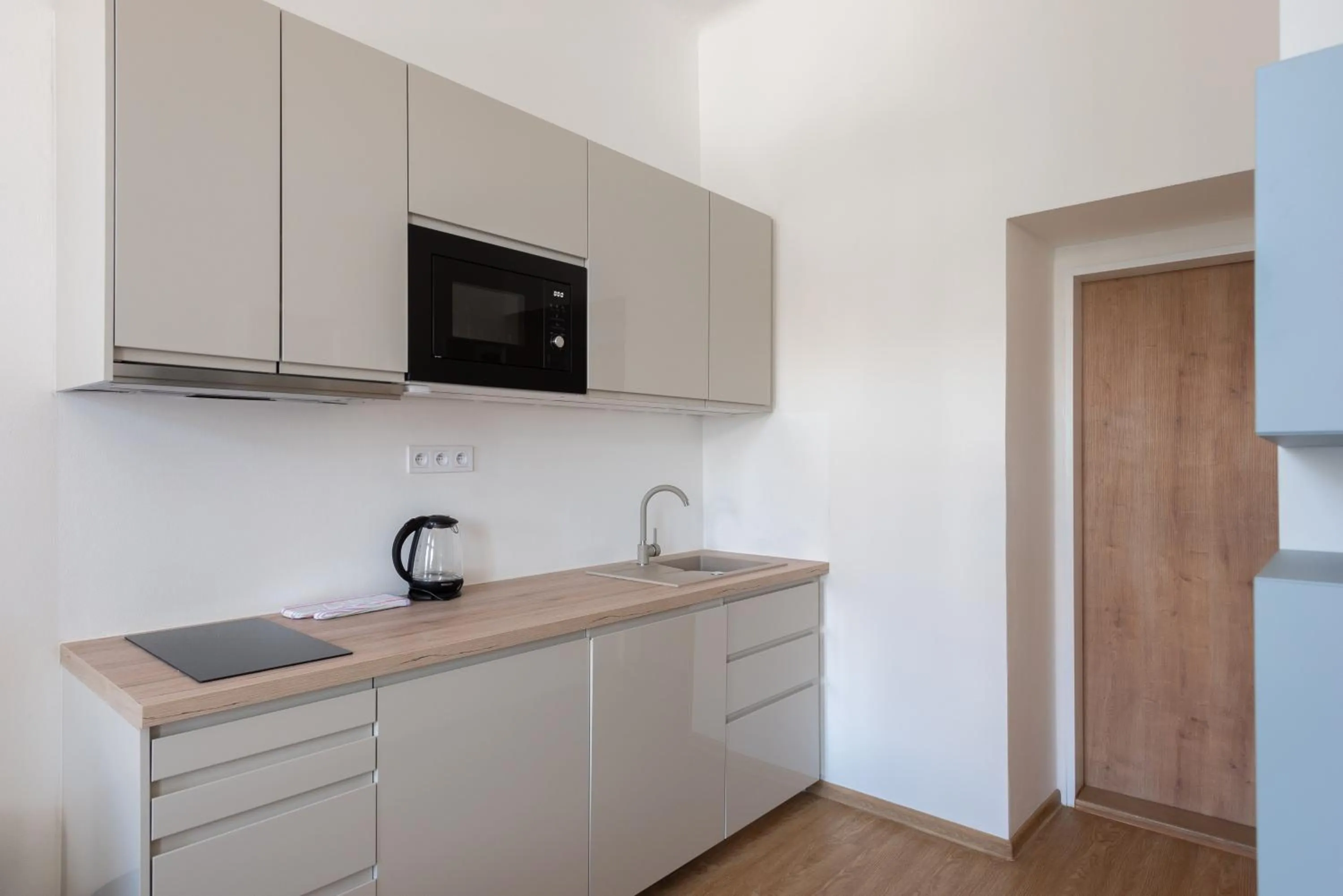 Kitchen or kitchenette in Tesnov Residence Apartments