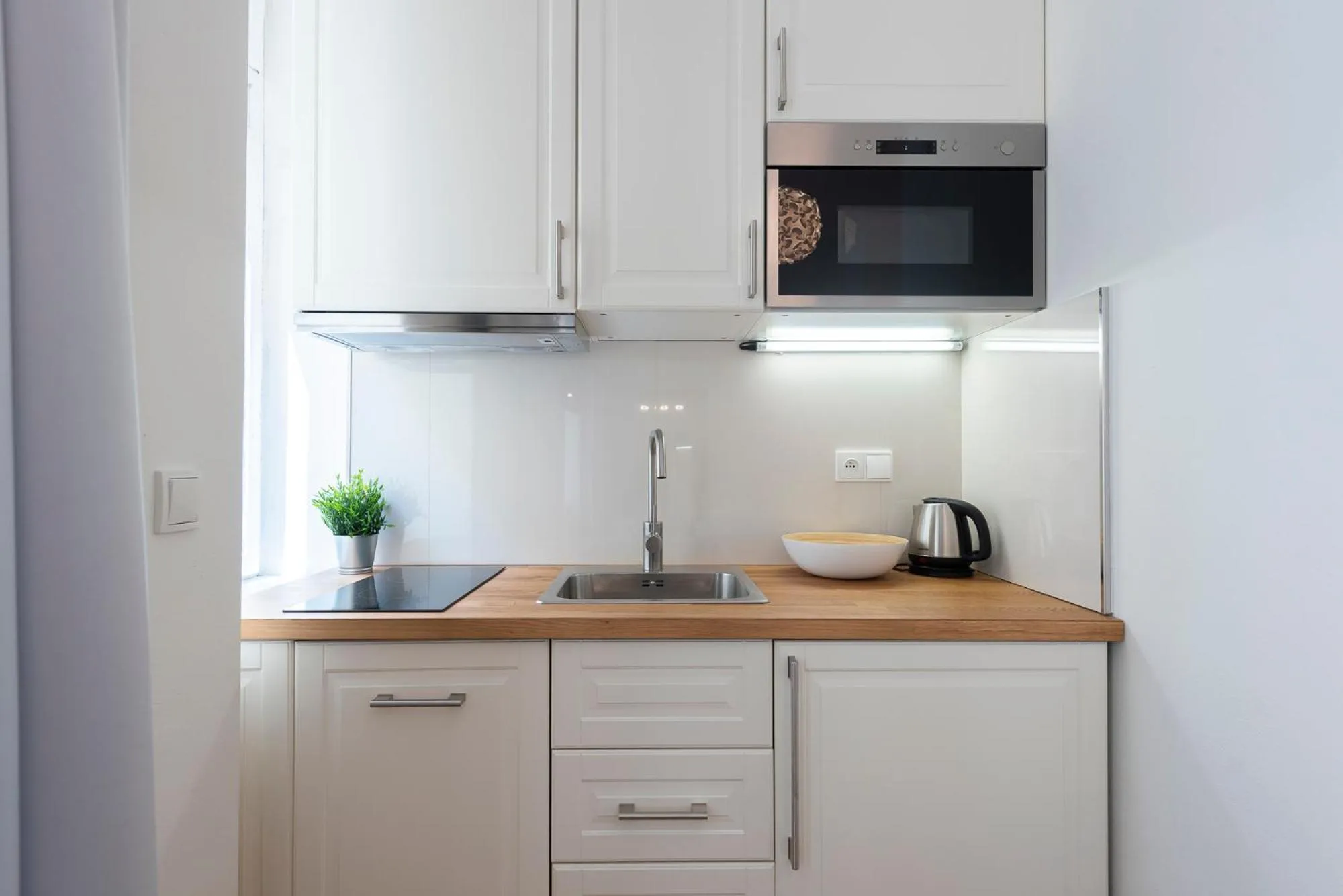 Kitchen or kitchenette in Tesnov Residence Apartments