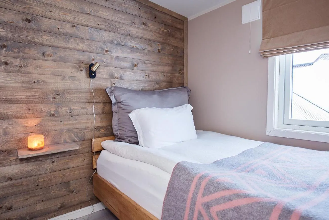 Bed in 8 Seasons Hotel