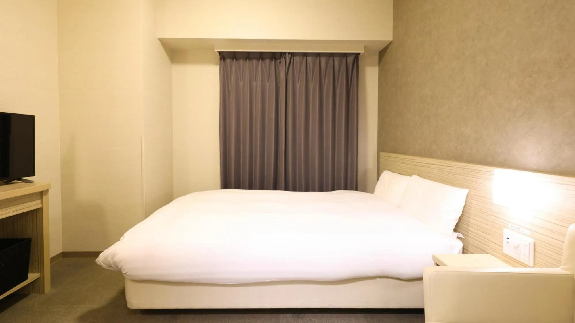 Bed in Dormy Inn Mishima