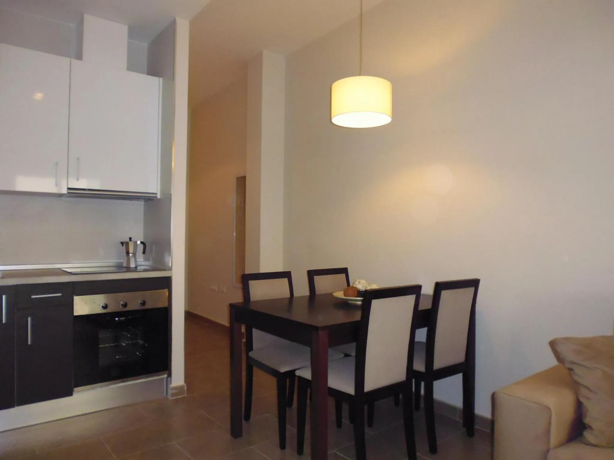 Kitchen or kitchenette in Apartamentos Pinar Malaga Centro