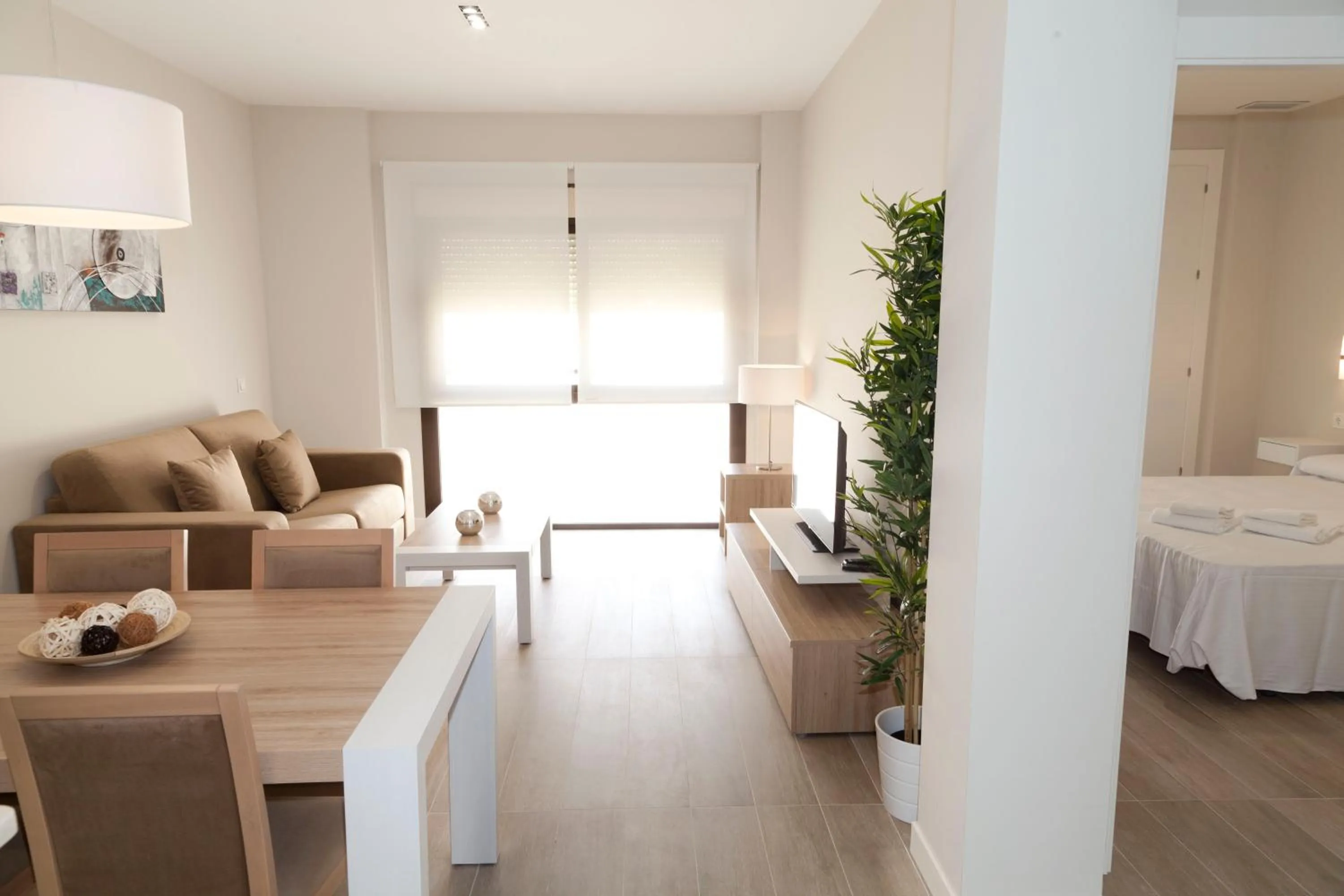 Living room, Bed in Apartamentos Pinar Malaga Centro