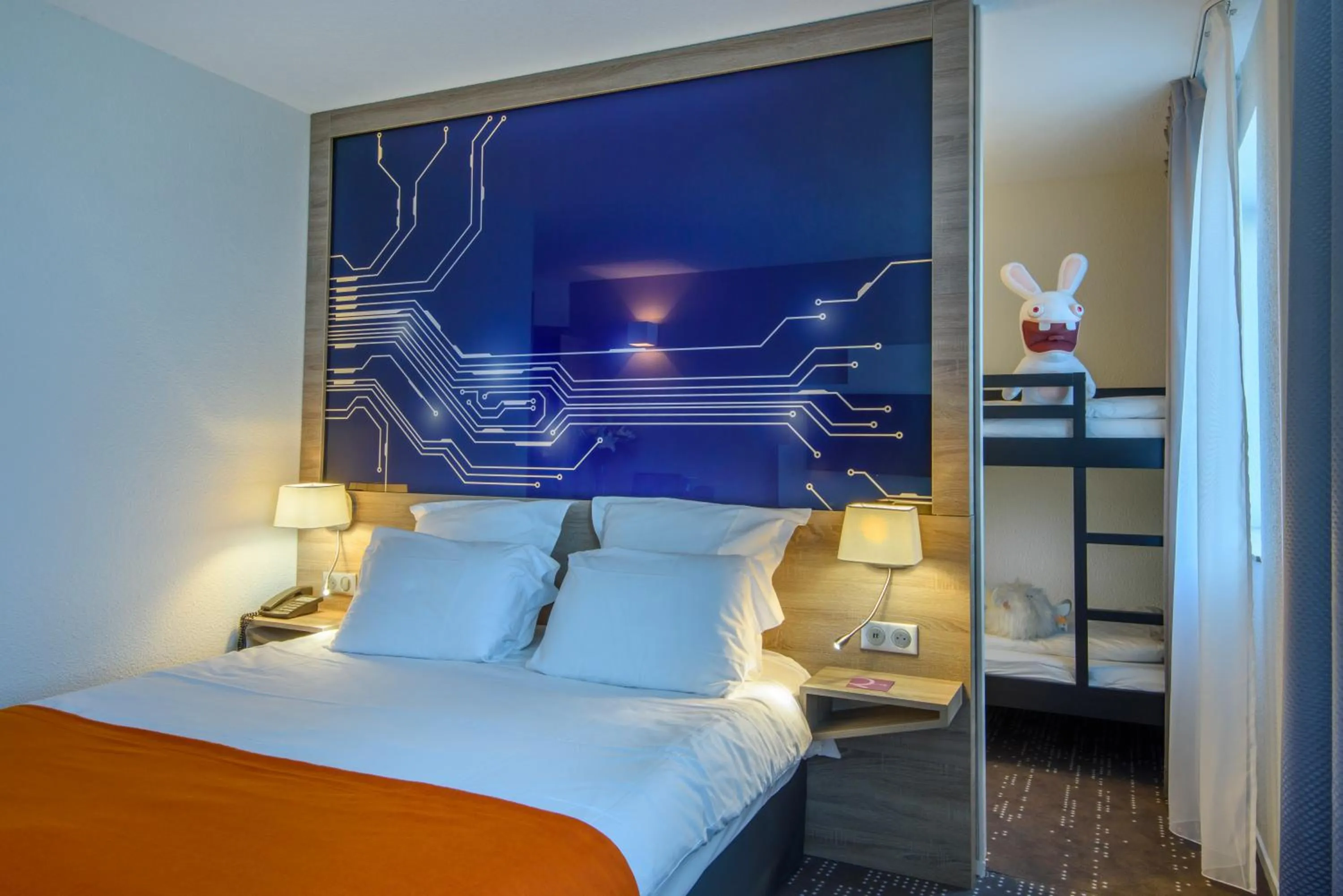 Photo of the whole room, Bed in Mercure Poitiers Site du Futuroscope